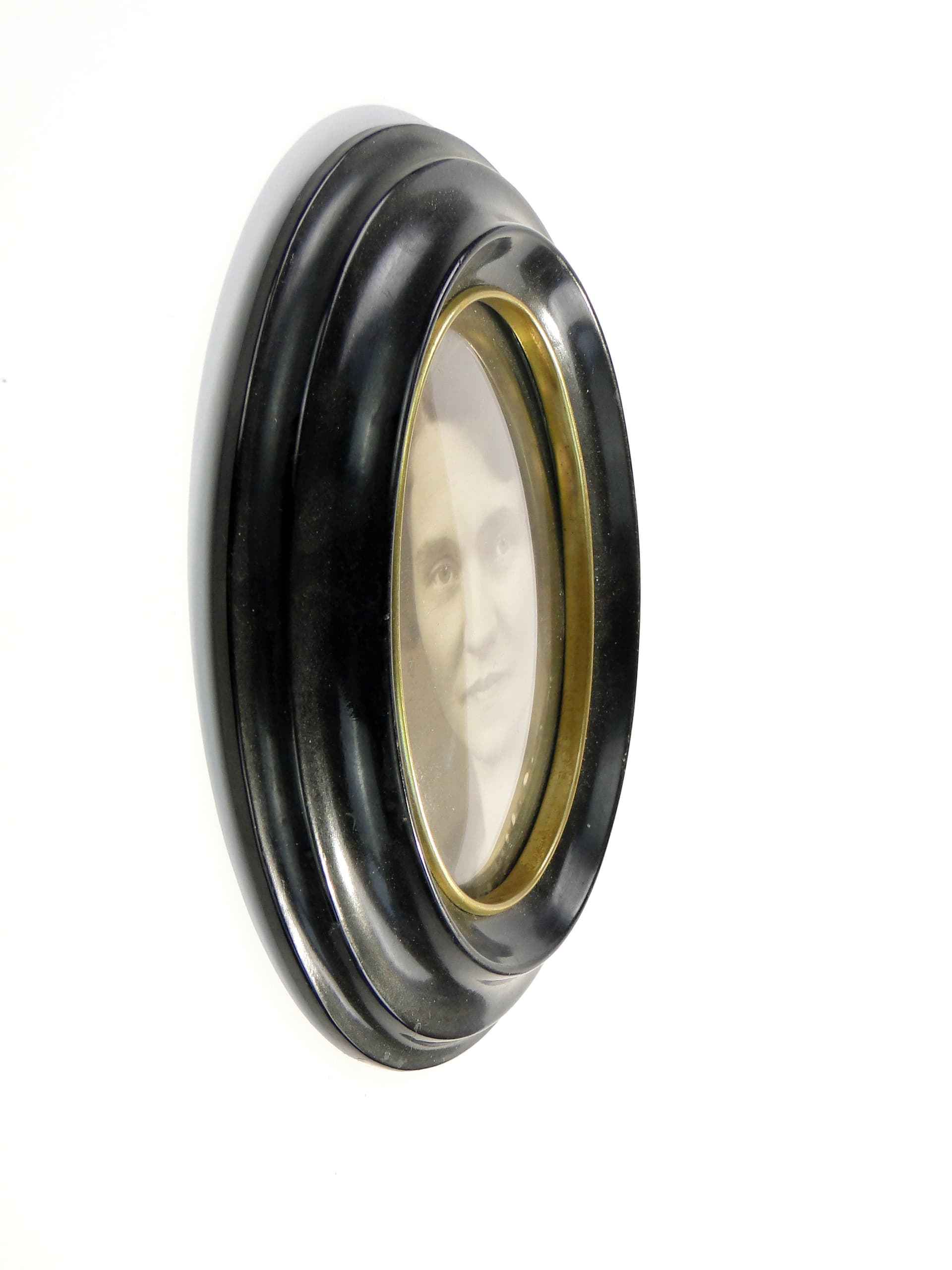 Elliptical photo frame, black bakelite, Sweden, 1950s. - 7885
