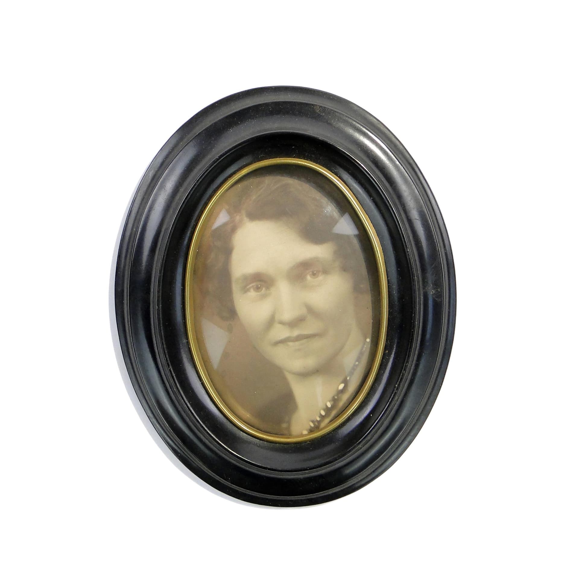 Elliptical photo frame, black bakelite, Sweden, 1950s.
