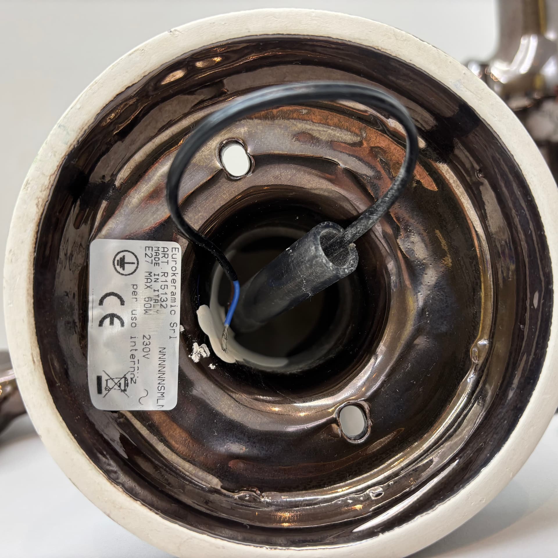 Pair of postmodern wall sconces, graphite, ceramic, Italy, 1990s. - 124197