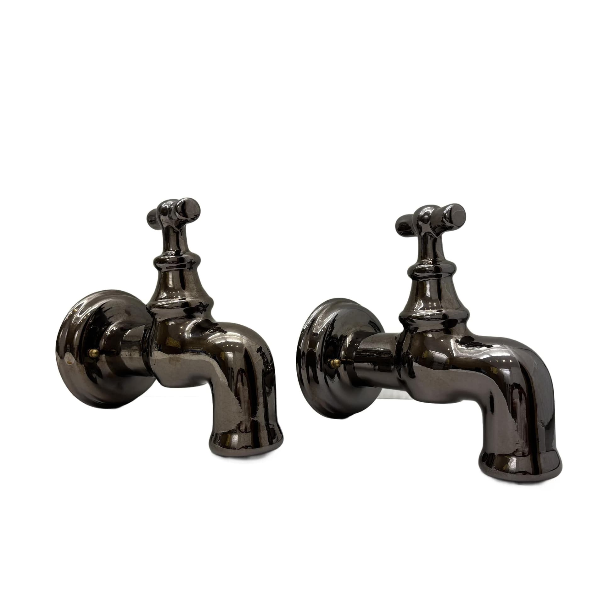 Pair of postmodern wall sconces, graphite, ceramic, Italy, 1990s.