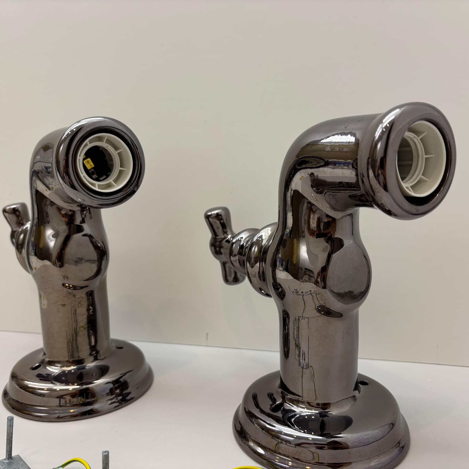 Pair of postmodern wall sconces, graphite, ceramic, Italy, 1990s. - 124194