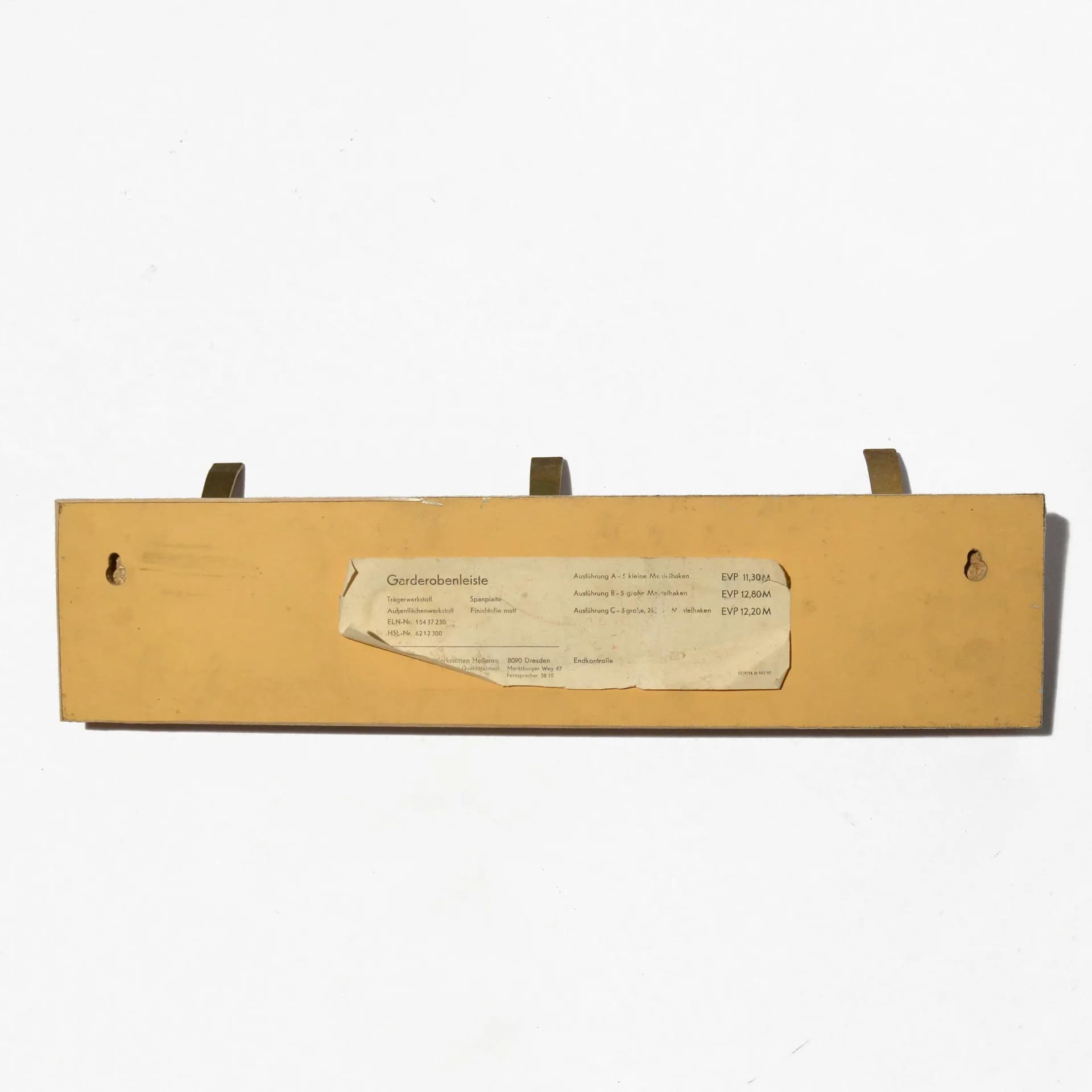 Wall-mounted rack, brown plywood, golden brass, VEB Deutsche Werkstätten Hellerau, Germany, 1970s. - 126804