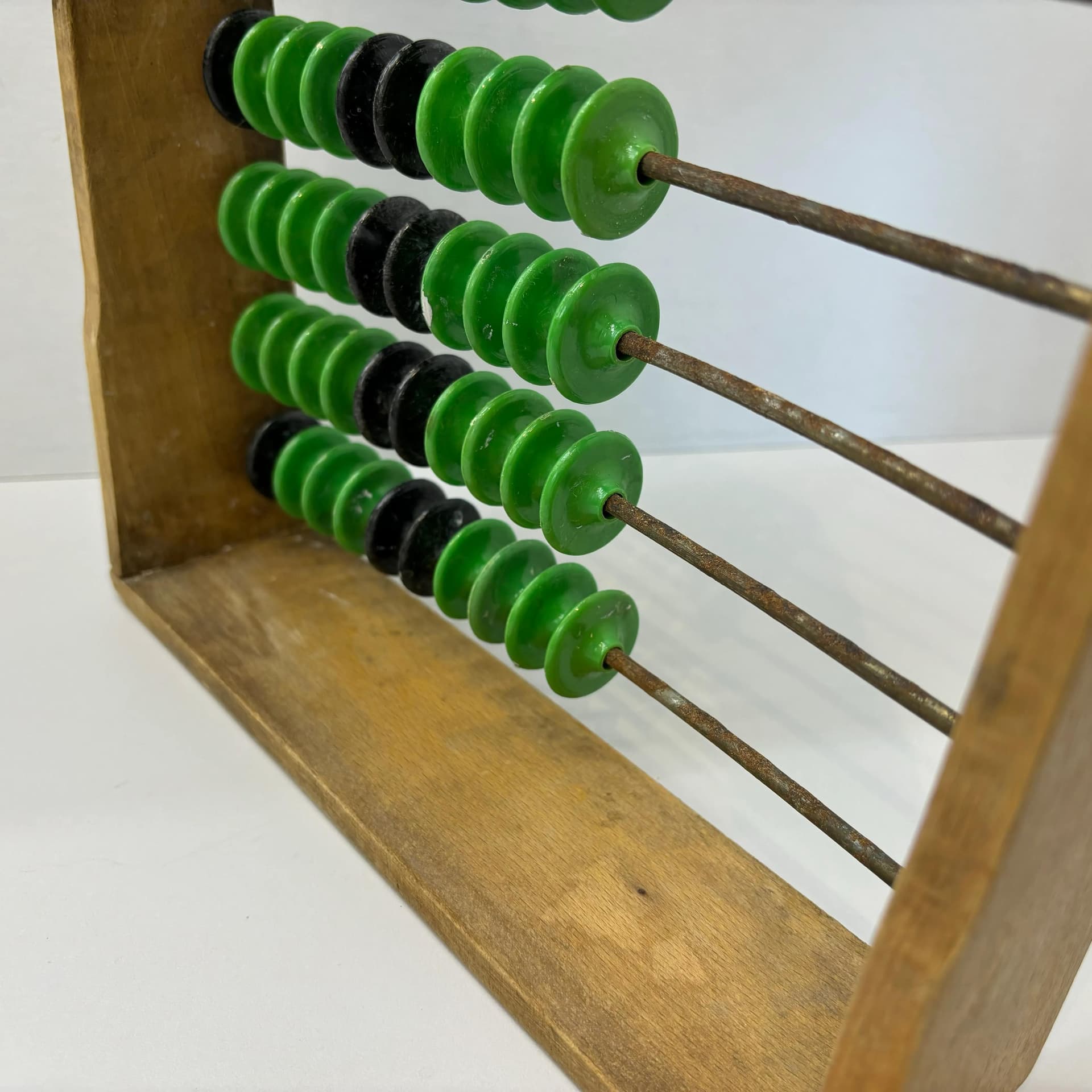 Abacus, beech wood honey, metal, green black plastic, Poland, 1960s. - 8925