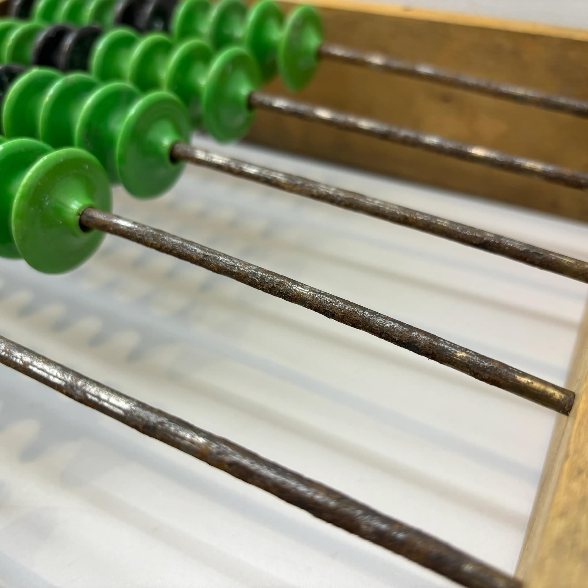 Abacus, beech wood honey, metal, green black plastic, Poland, 1960s. - 8926