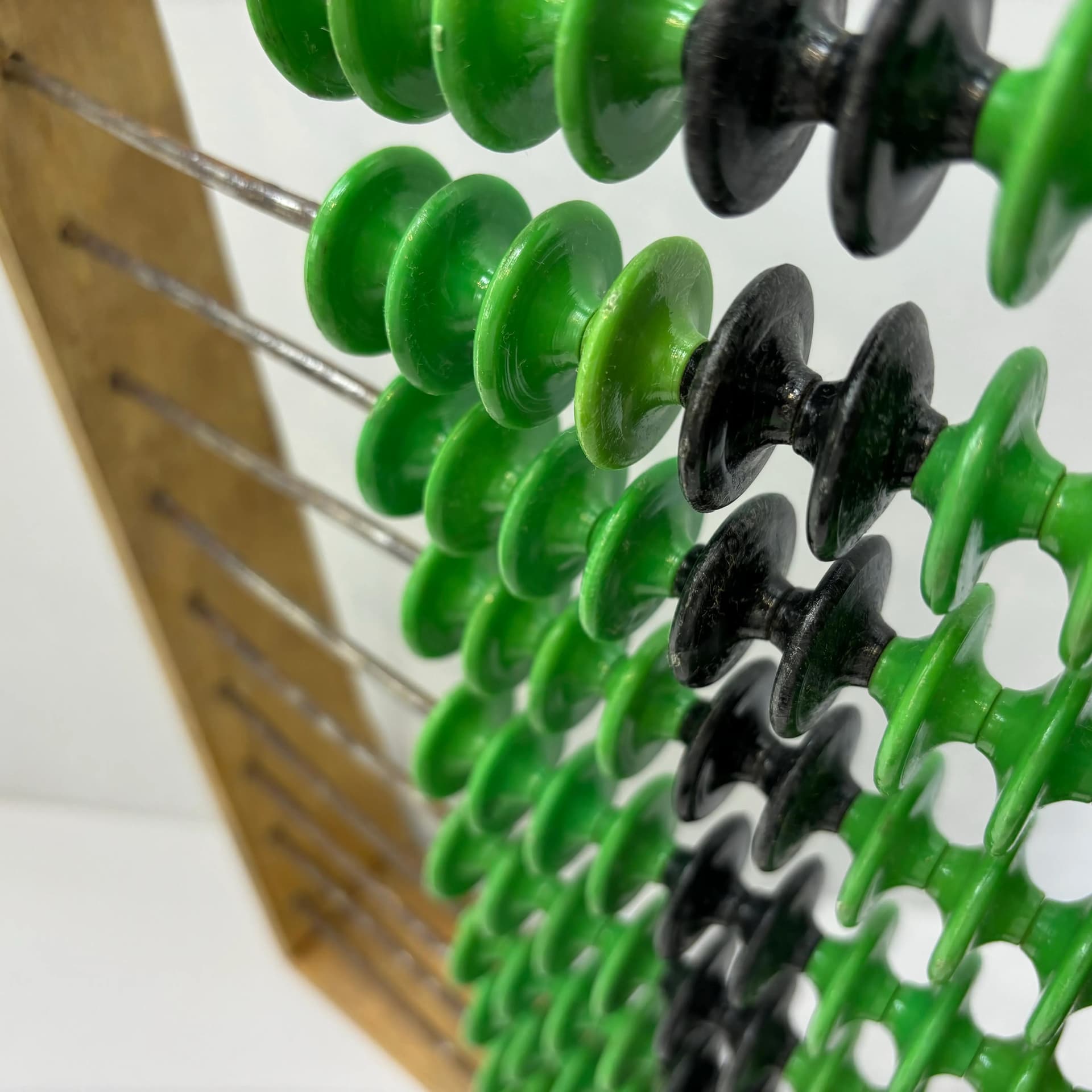 Abacus, beech wood honey, metal, green black plastic, Poland, 1960s. - 8929