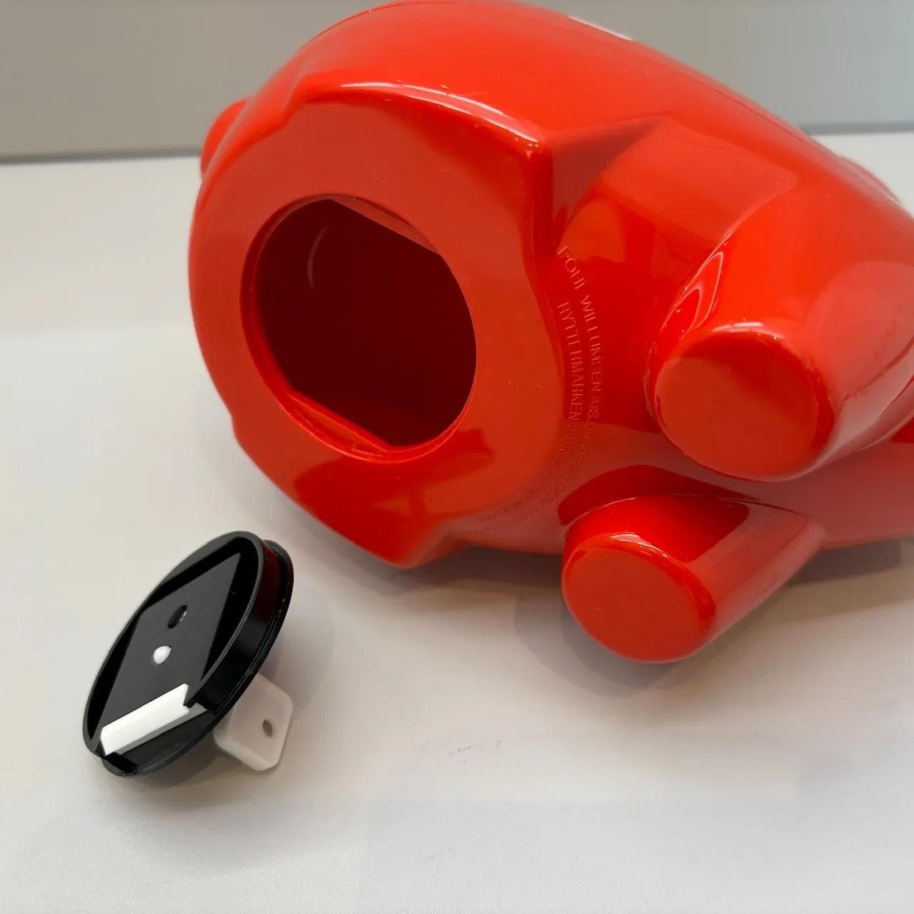 Piggy bank, red plastic, by P. Willumsen, Denmark, 2000s. - 8873