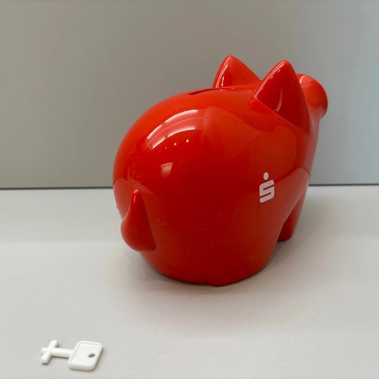 Piggy bank, red plastic, by P. Willumsen, Denmark, 2000s. - 8879