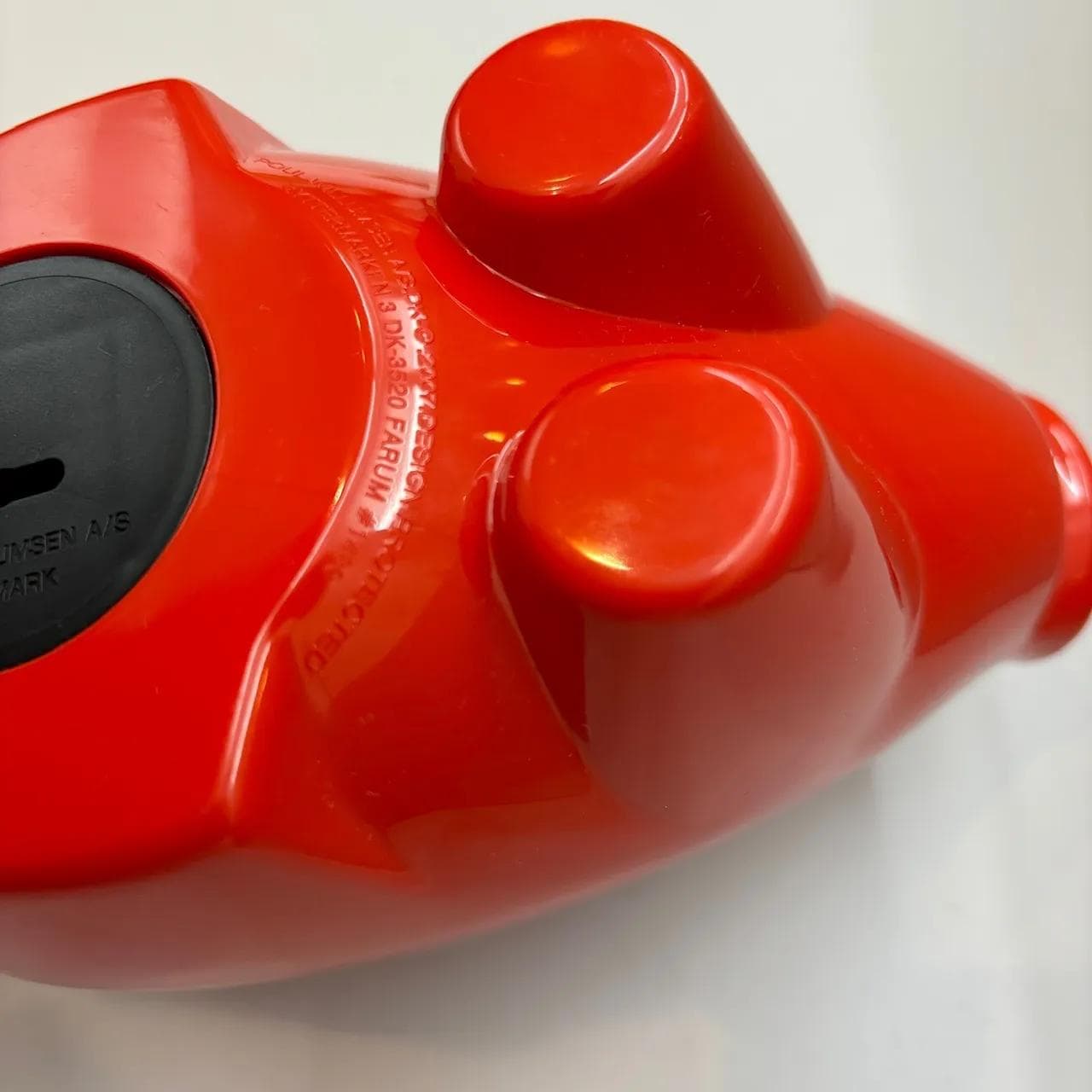 Piggy bank, red plastic, by P. Willumsen, Denmark, 2000s. - 8875