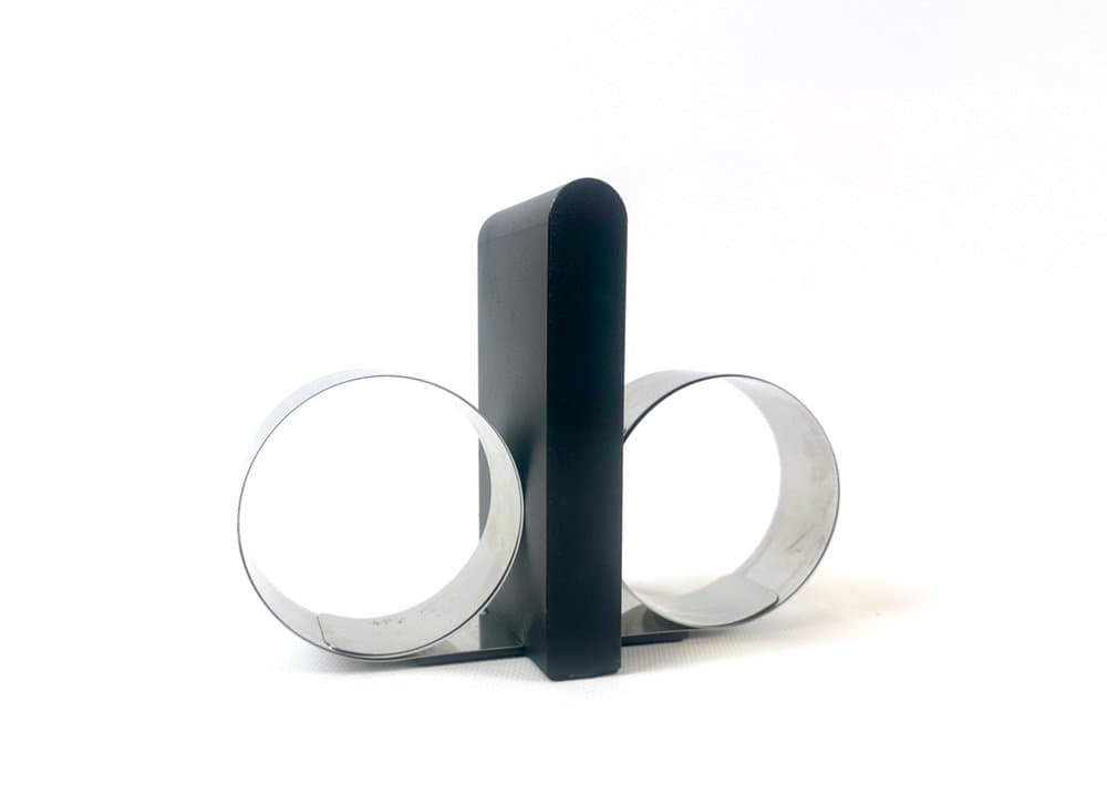 Podpórka do książek, czarny plastik, stal, proj. A. Mikkelsen, Georg Jensen, Dania, lata 90. - 152525
