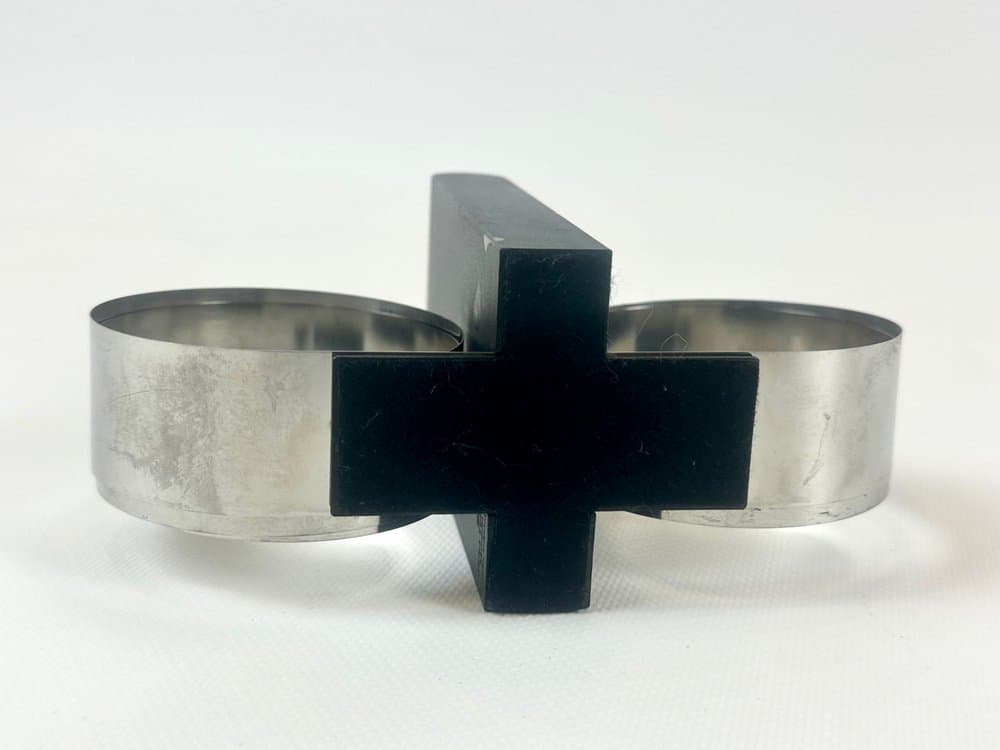 Podpórka do książek, czarny plastik, stal, proj. A. Mikkelsen, Georg Jensen, Dania, lata 90. - 152524