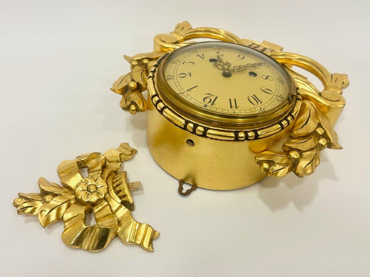 Wall clock, Rococo style, golden, wood, Sweden, 1960s. - 153583