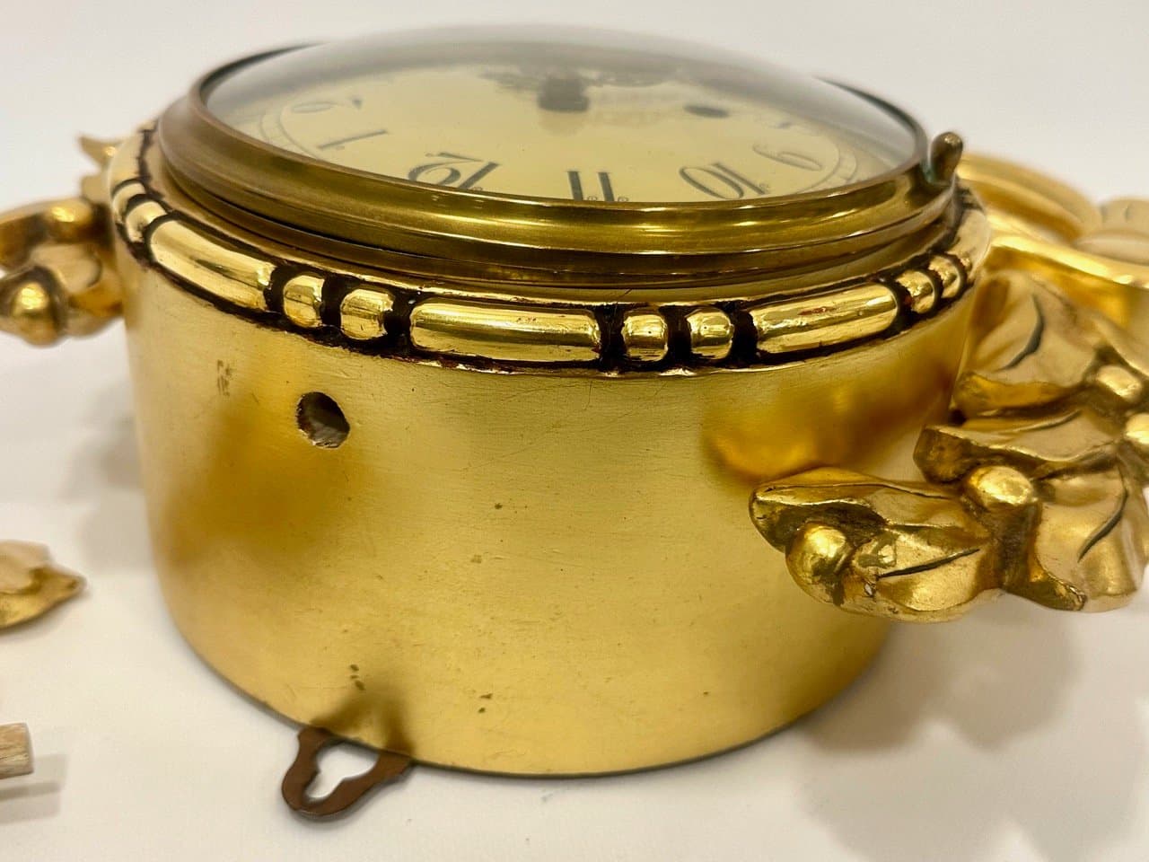 Wall clock, Rococo style, golden, wood, Sweden, 1960s. - 153582