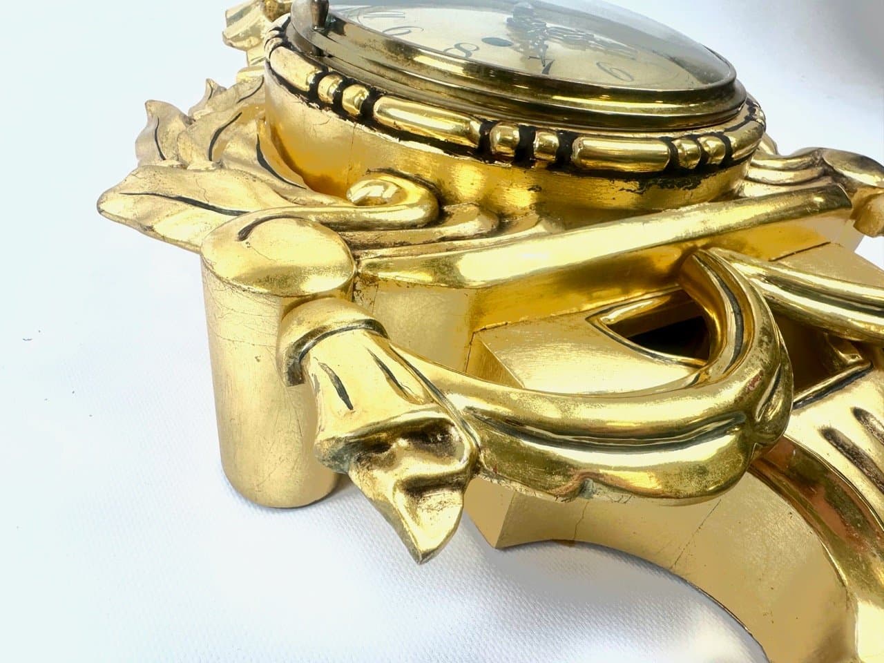 Wall clock, Rococo style, golden, wood, Sweden, 1960s. - 153587