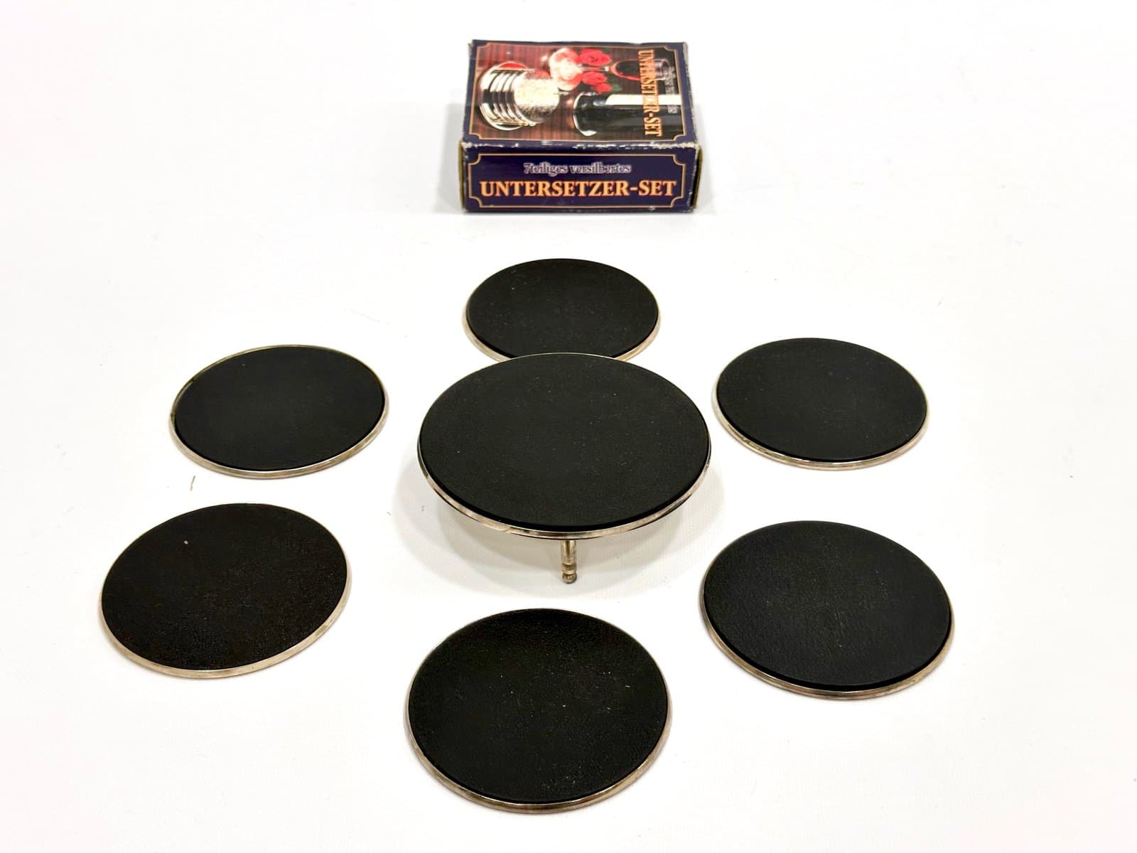 Zestaw siedmiu podstawek, srebrny, metal srebrzony, Niemcy, lata 80. - 155099