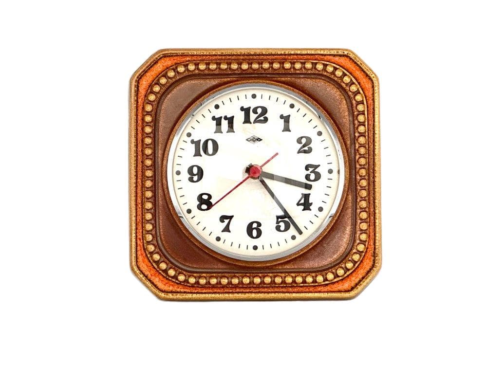 Wall clock, brown orange, ceramic, Germany, 1960s.