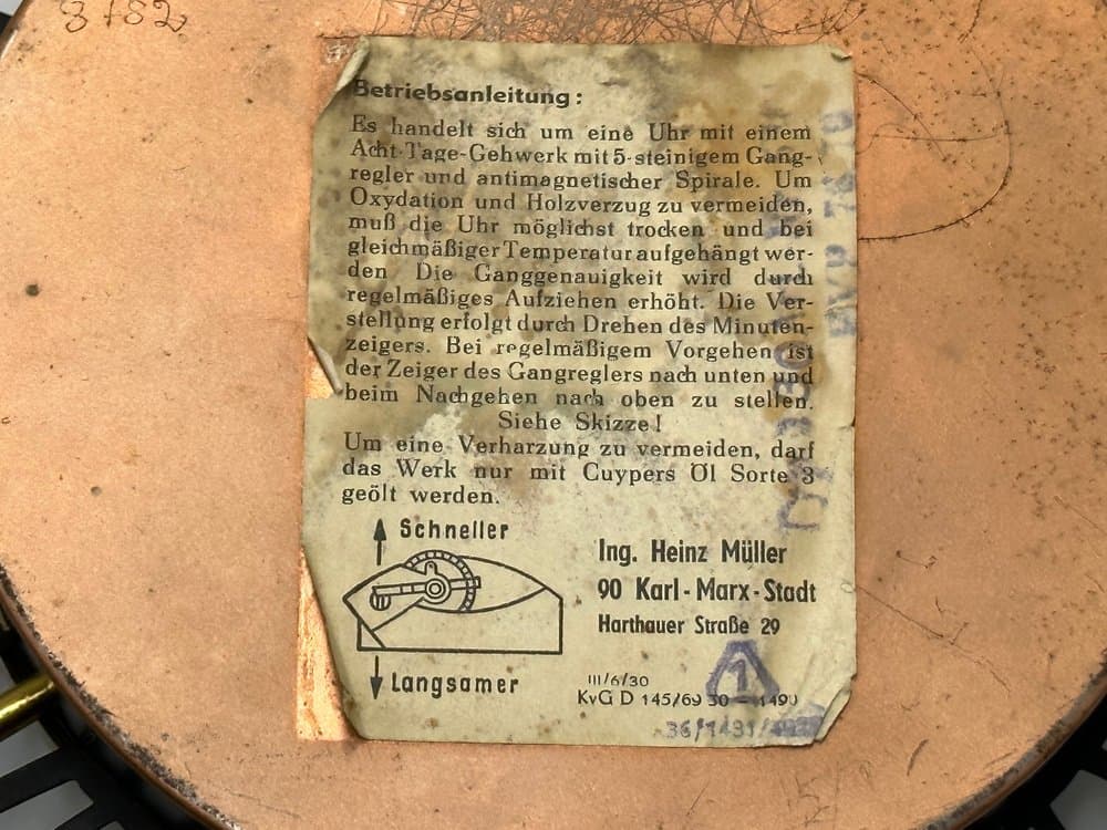 Zegar ścienny Sunburst, czarny złoty, mosiądz stal szkło, Niemcy, lata 60. - 156194