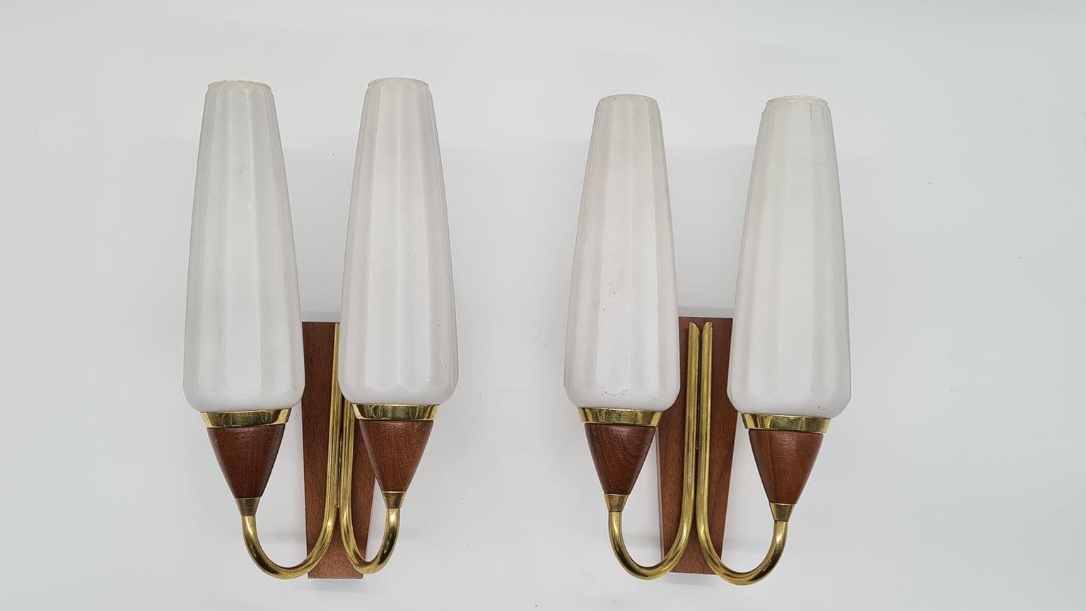 Pair of wall sconces, brown teak, brass, white glass, Germany, 1960s. - 158170