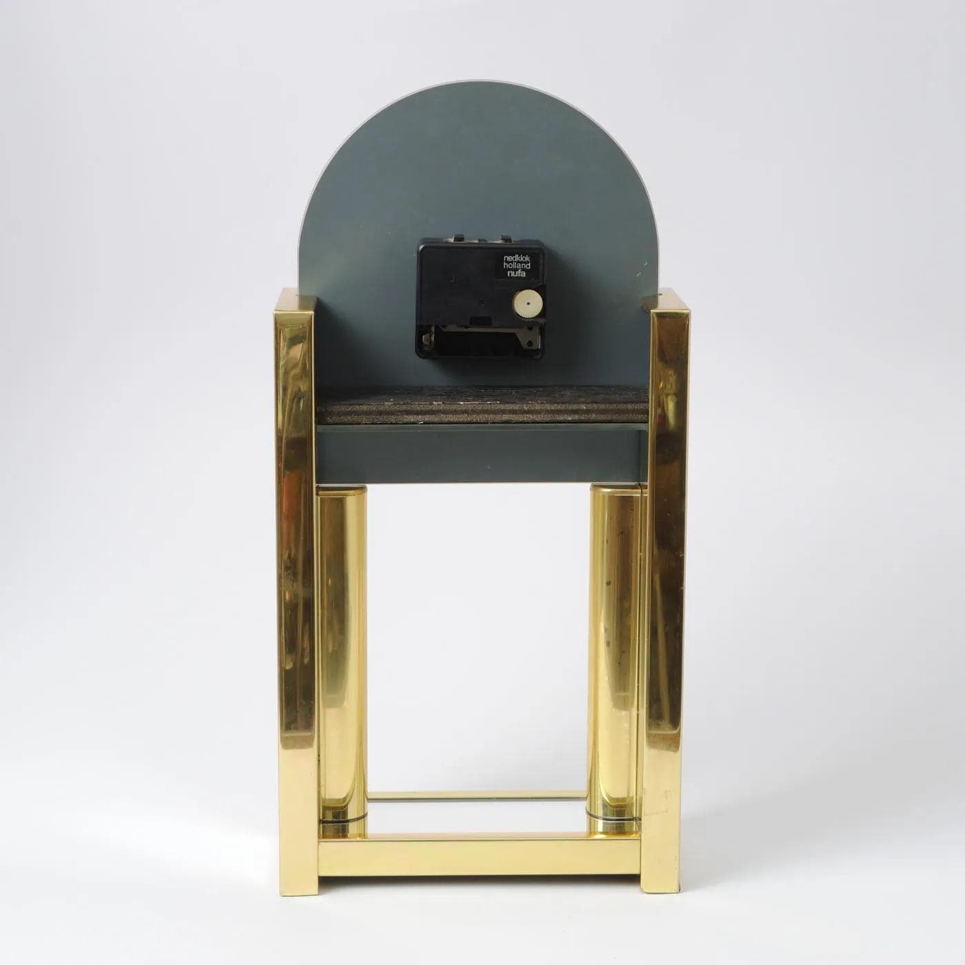 Clock, golden metal, Netherlands, 1980s. - 161434