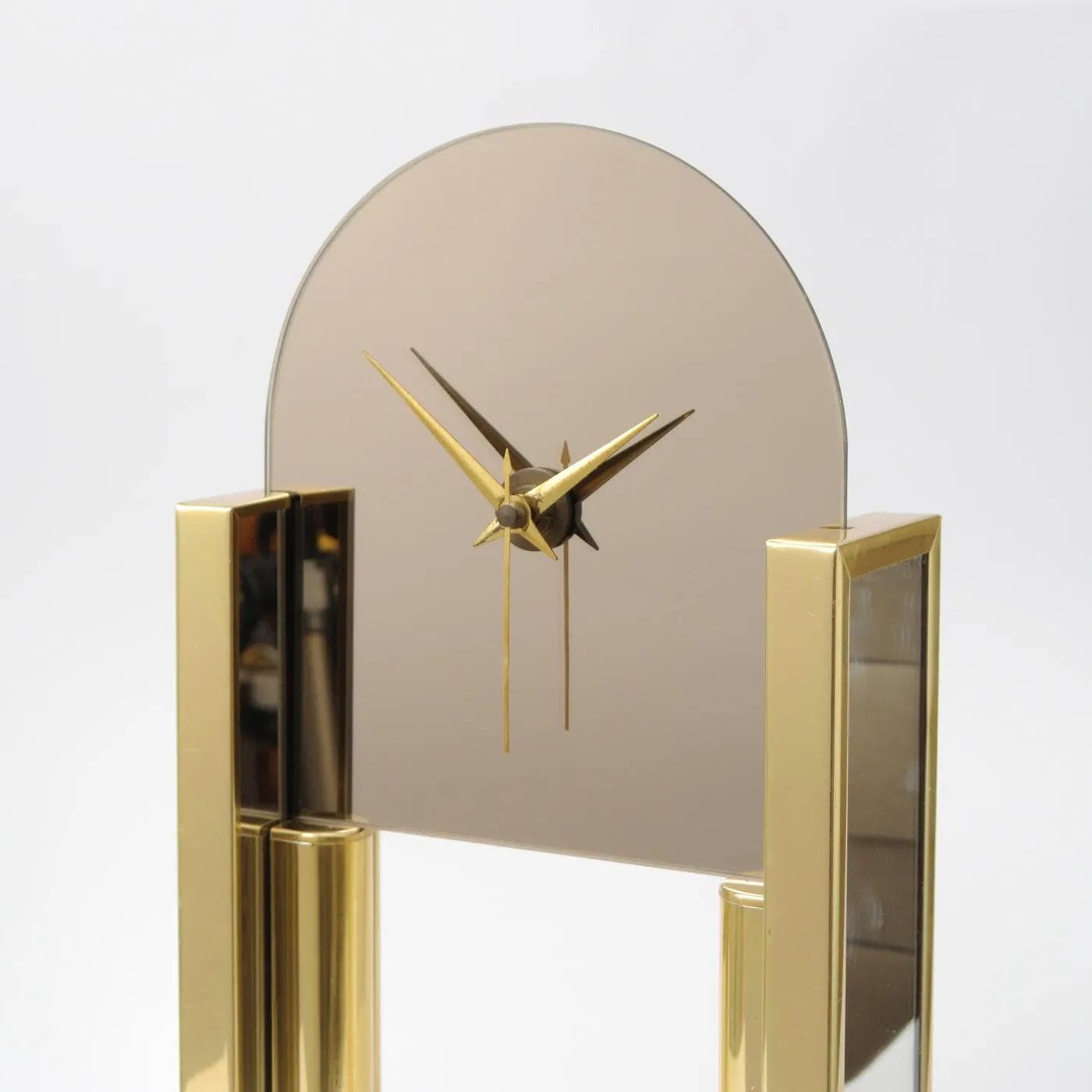 Clock, golden metal, Netherlands, 1980s. - 161429