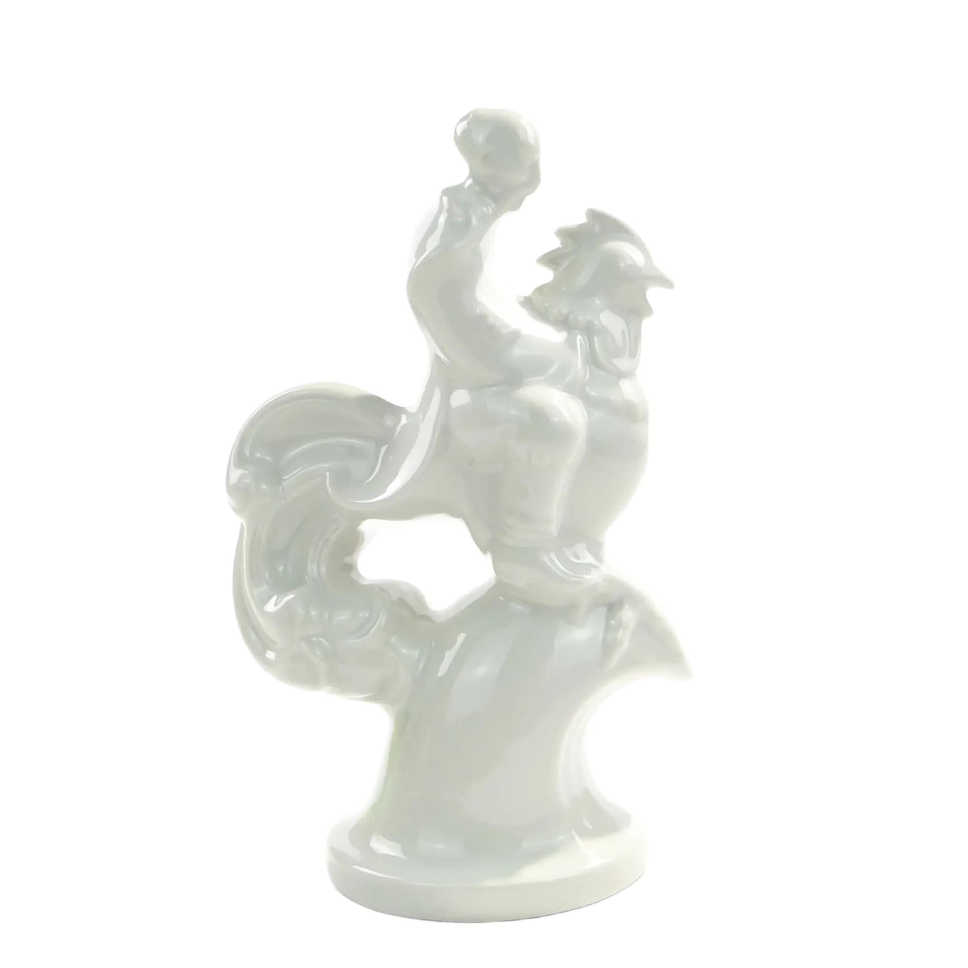 Figurka Twardowski na kogucie, porcelana biała, proj. T. Szafran, Ćmielów, Polska, lata 30.