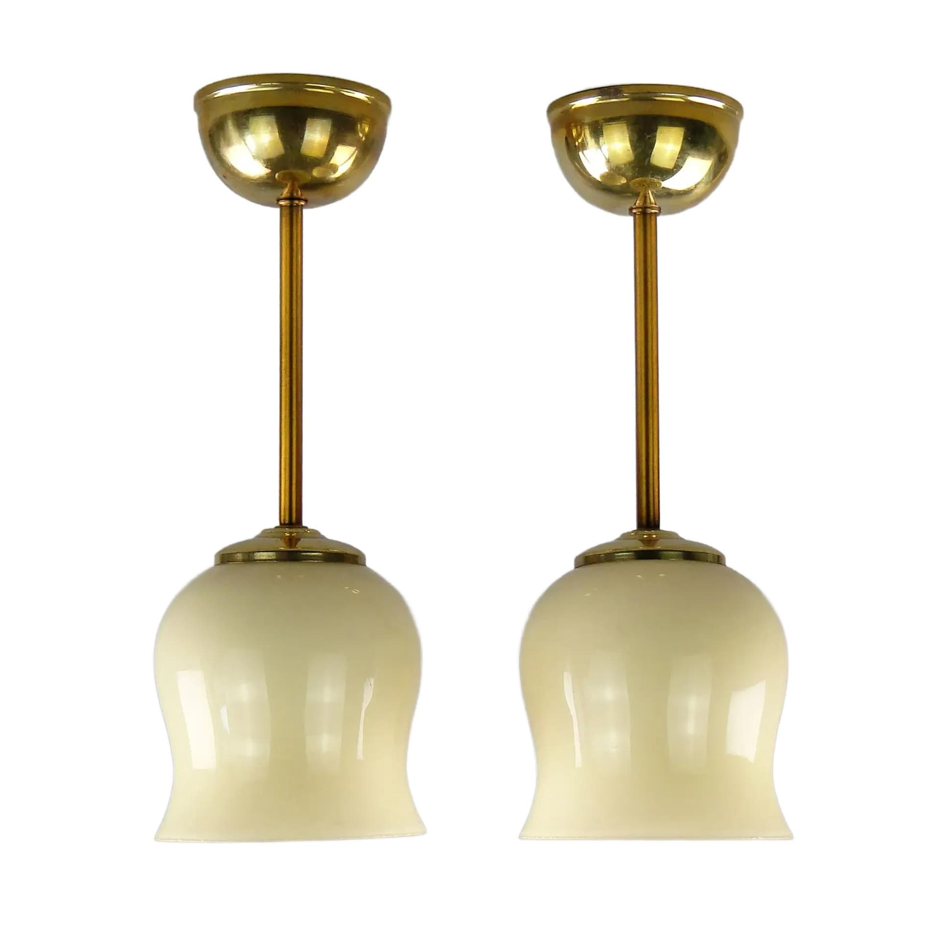 Pair of ceiling lamps, ecru glass, brass, Poland, 1950s