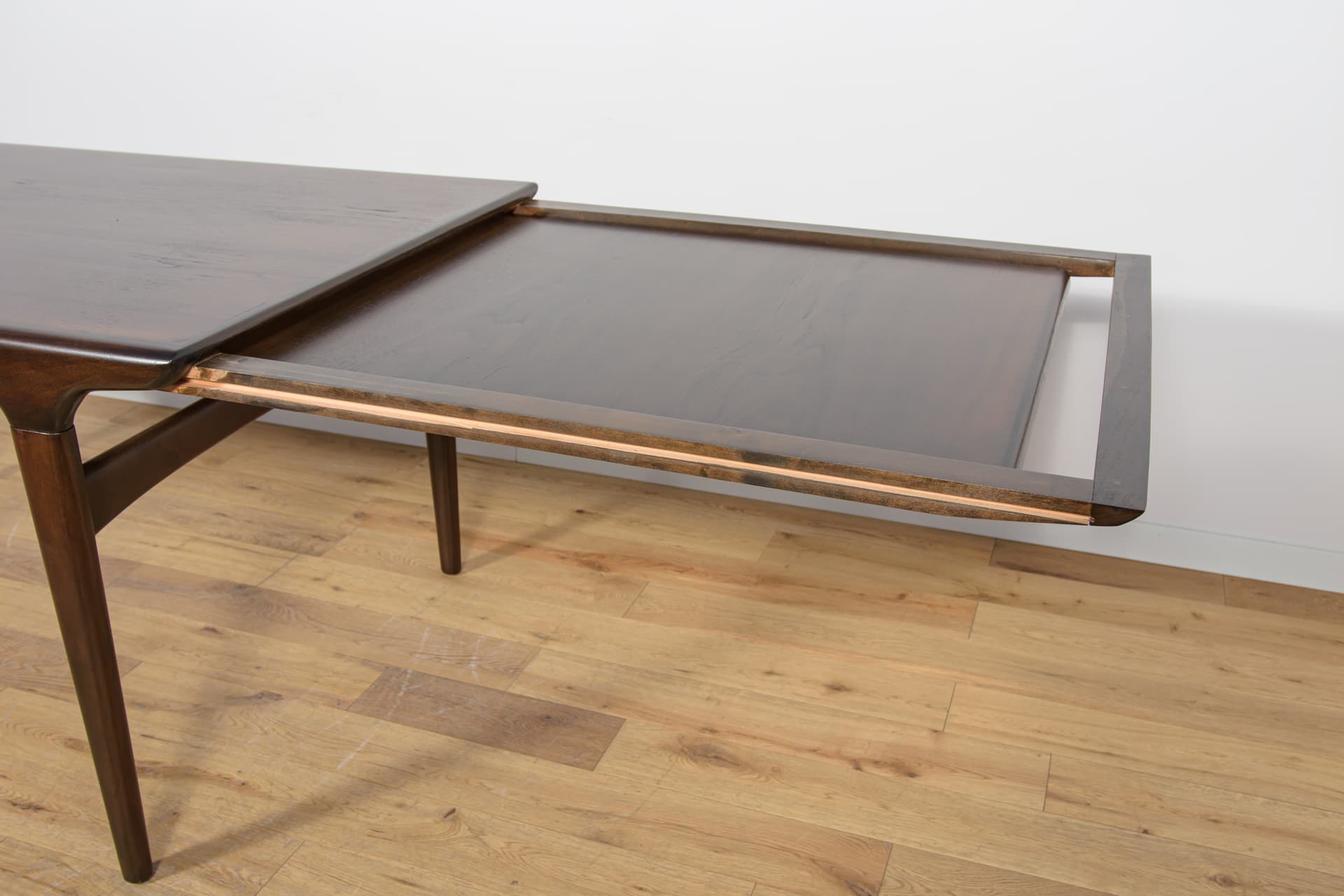 Stół rozkładany, teak brązowy ciemny, proj. J. Andersen, Uldum Møbelfabrik, Dania, lata 60. - 168377