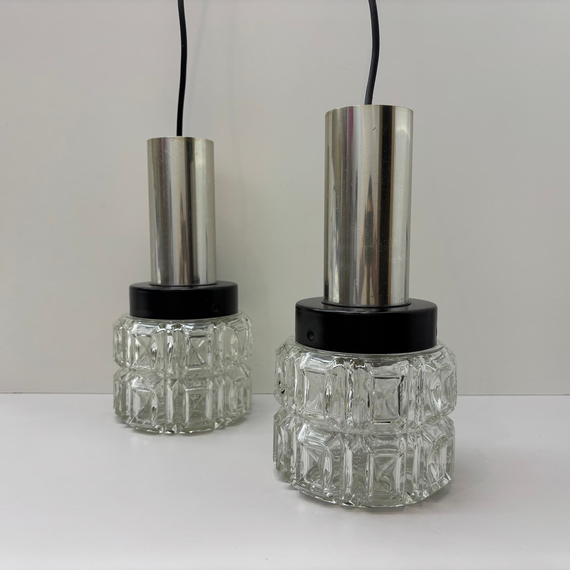 Pair of pendant lamps, silver, aluminum steel glass, Germany, 1980s. - 169303