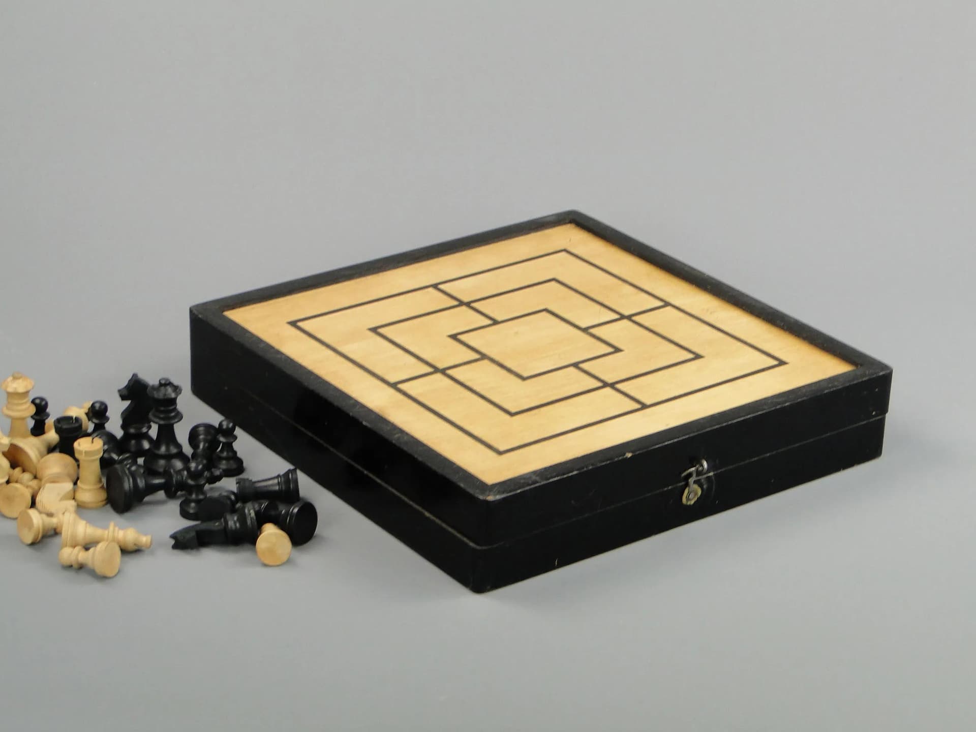 Chess set, black, light wood, black wood, Poland, 1960s. - 11607