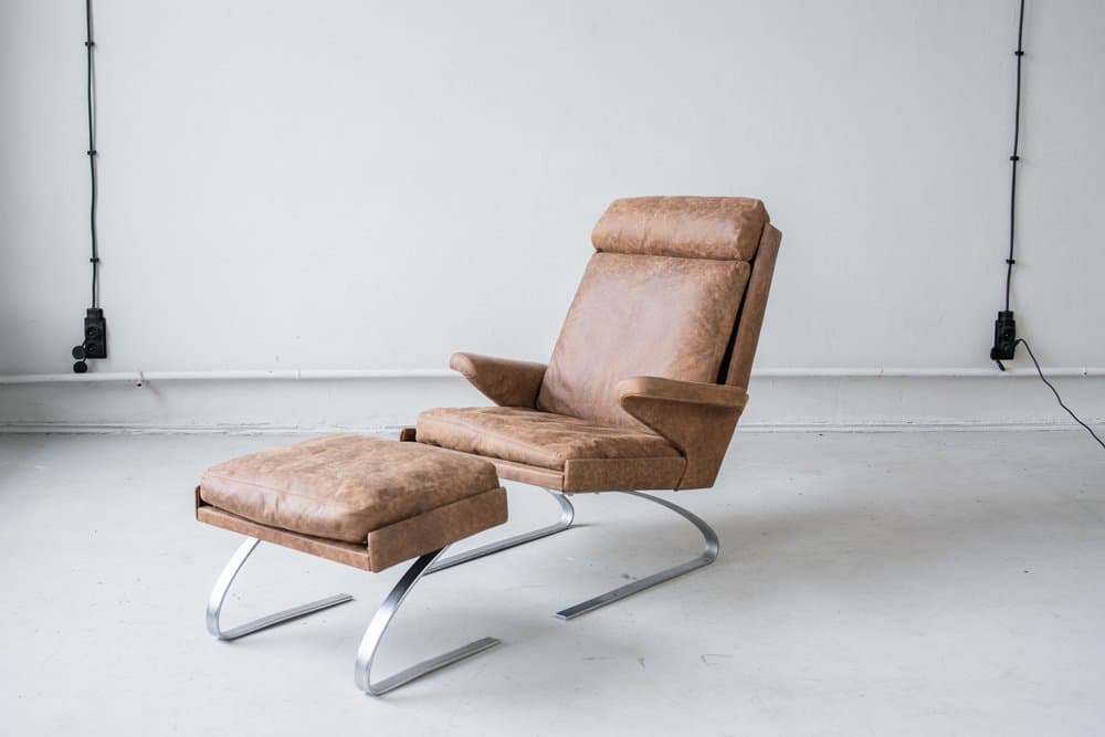 Zestaw fotel bujany z podnóżkiem, skóra, proj. R. Adolf, COR, lata 70. - 184289