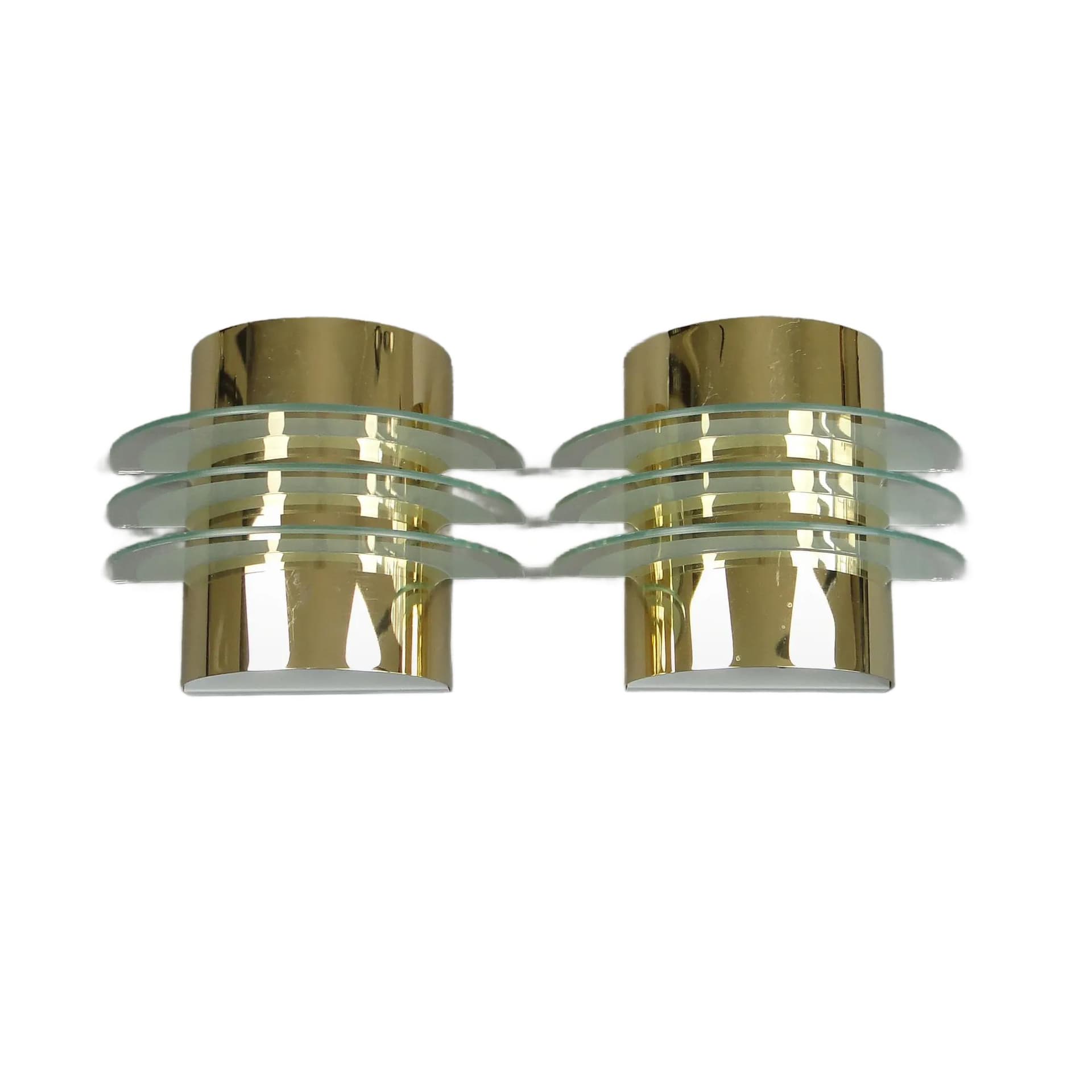 Pair of modernist wall sconces, golden brass, clear glass, Germany, 1970s