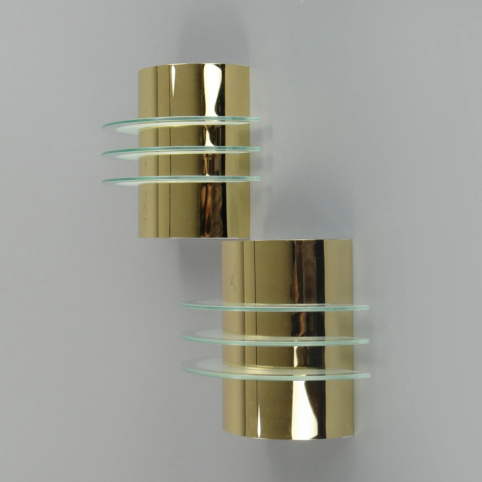 Pair of modernist wall sconces, golden brass, clear glass, Germany, 1970s - 13238