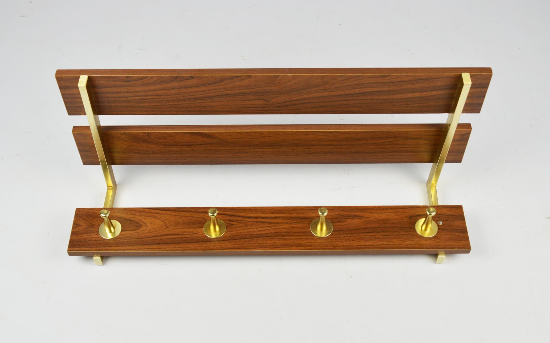 Wall-mounted coat rack, light brown wood, brass, 1970s. - 195987
