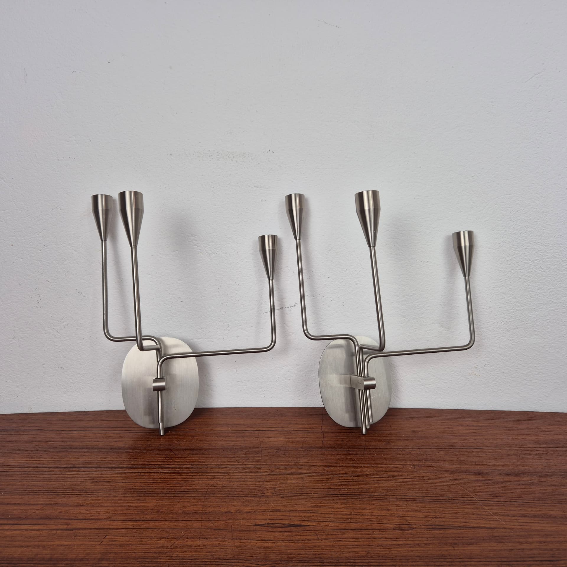 Świecznik ścienny Orion, stal nierdzewna srebrny, proj. P. Hein, Dania, XXI w. - 196963