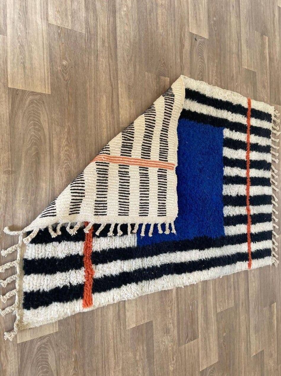 Ręcznie tkany dywan 140x260 cm, wełna, niebieski, czarny, kość słoniowa, pomarańczowy, Maroko - 205323