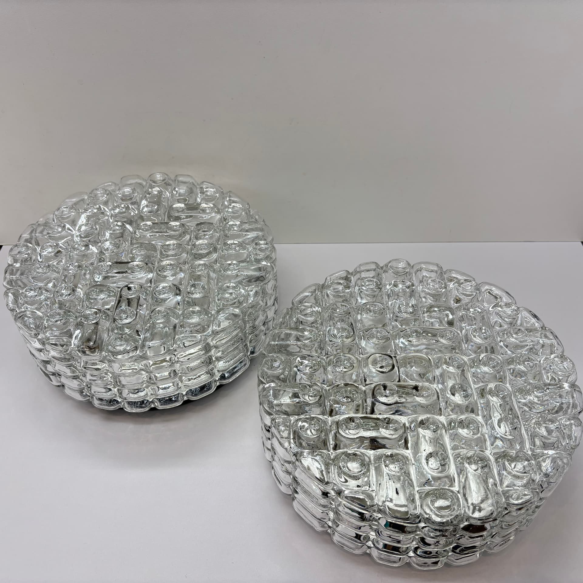 Pair of geometric wall sconces, transparent glass, metal, ERCO, Germany, 1970s. - 225757