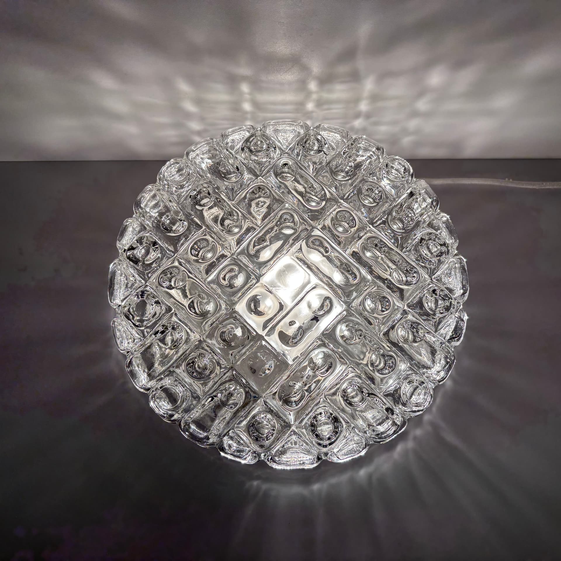 Pair of geometric wall sconces, transparent glass, metal, ERCO, Germany, 1970s. - 225751