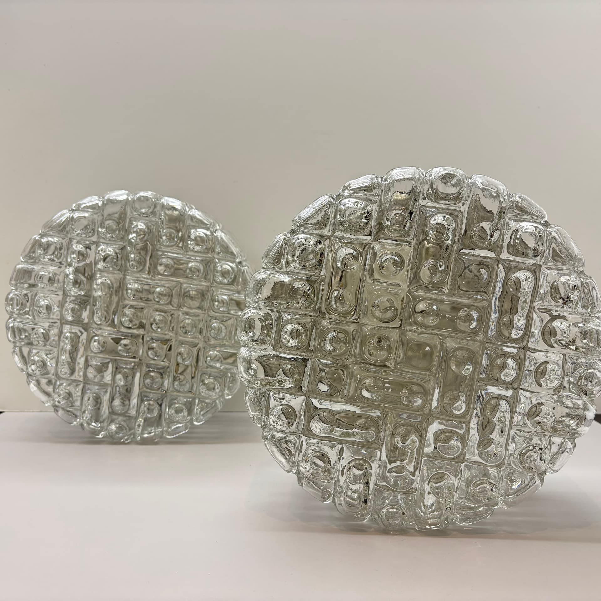 Pair of geometric wall sconces, transparent glass, metal, ERCO, Germany, 1970s. - 225752