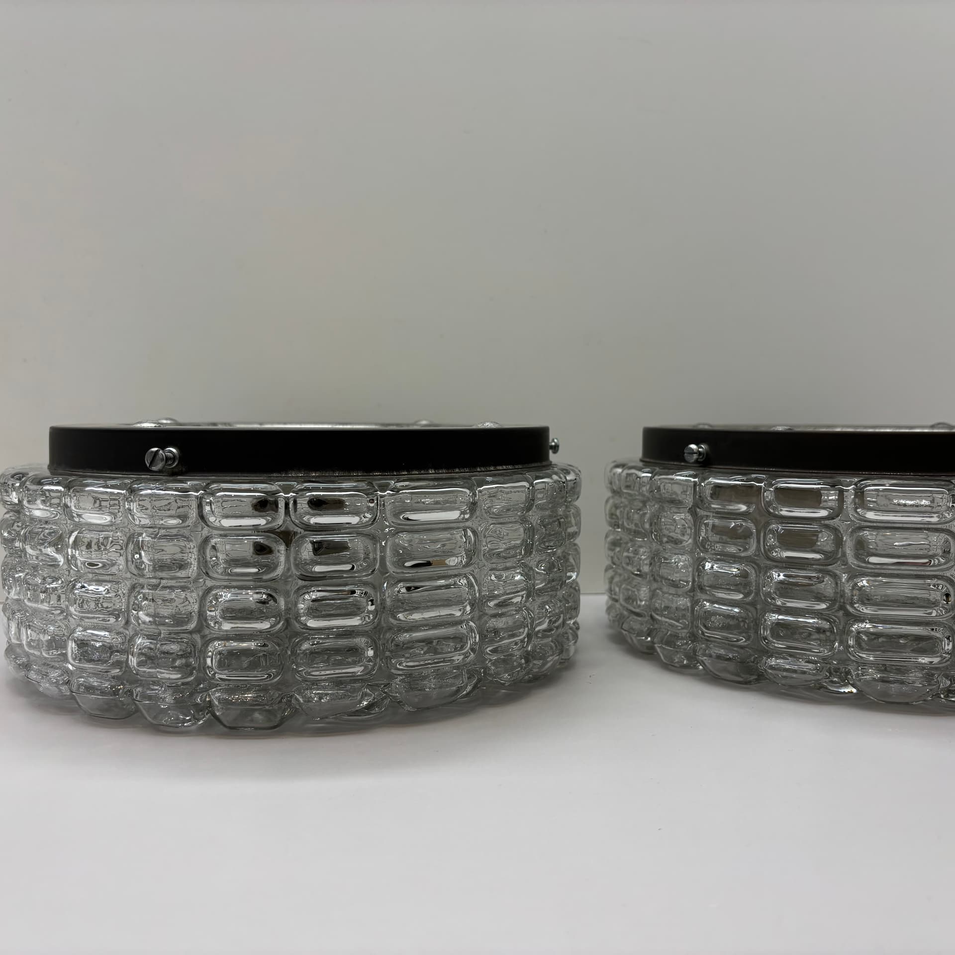 Pair of geometric wall sconces, transparent glass, metal, ERCO, Germany, 1970s. - 225746