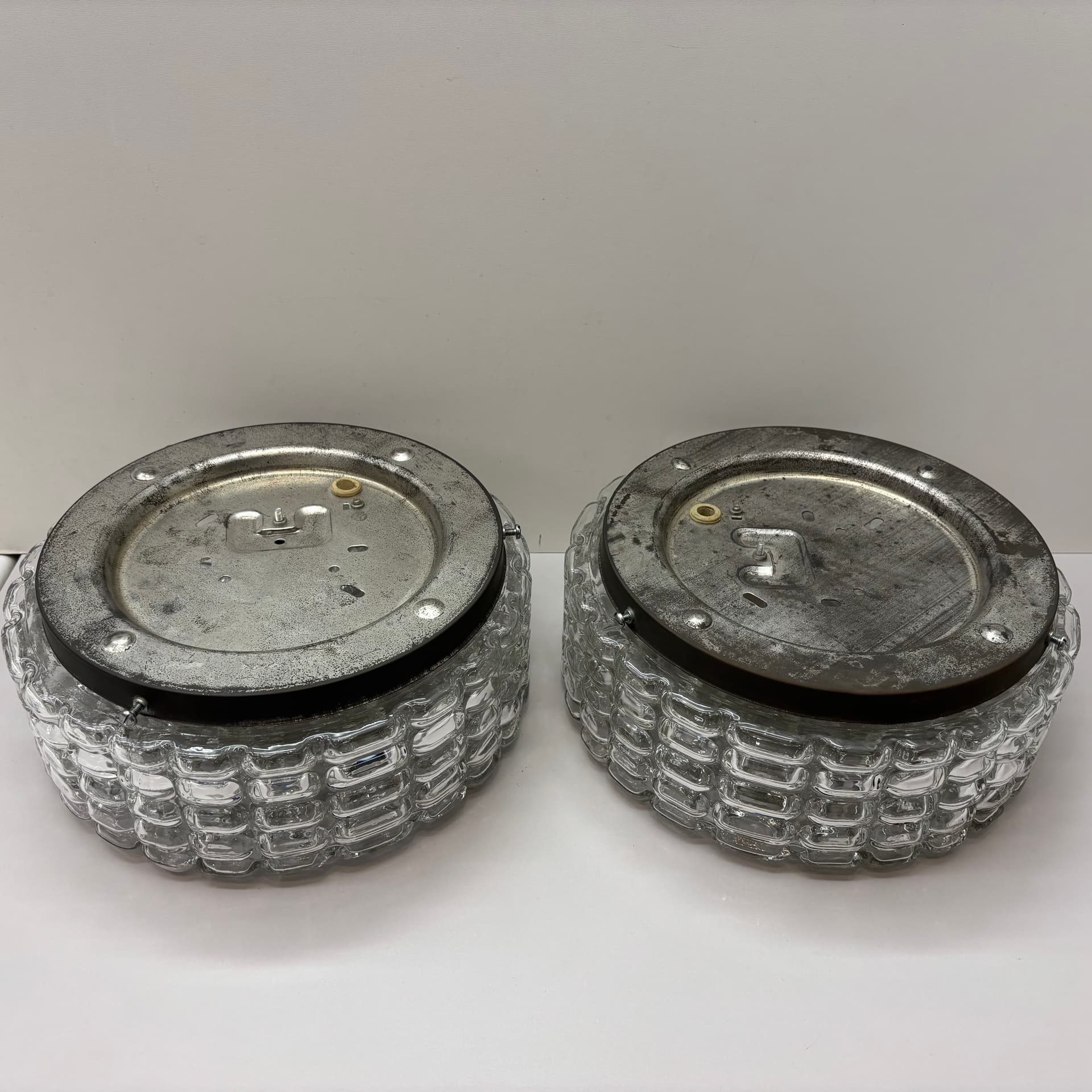 Pair of geometric wall sconces, transparent glass, metal, ERCO, Germany, 1970s. - 225754