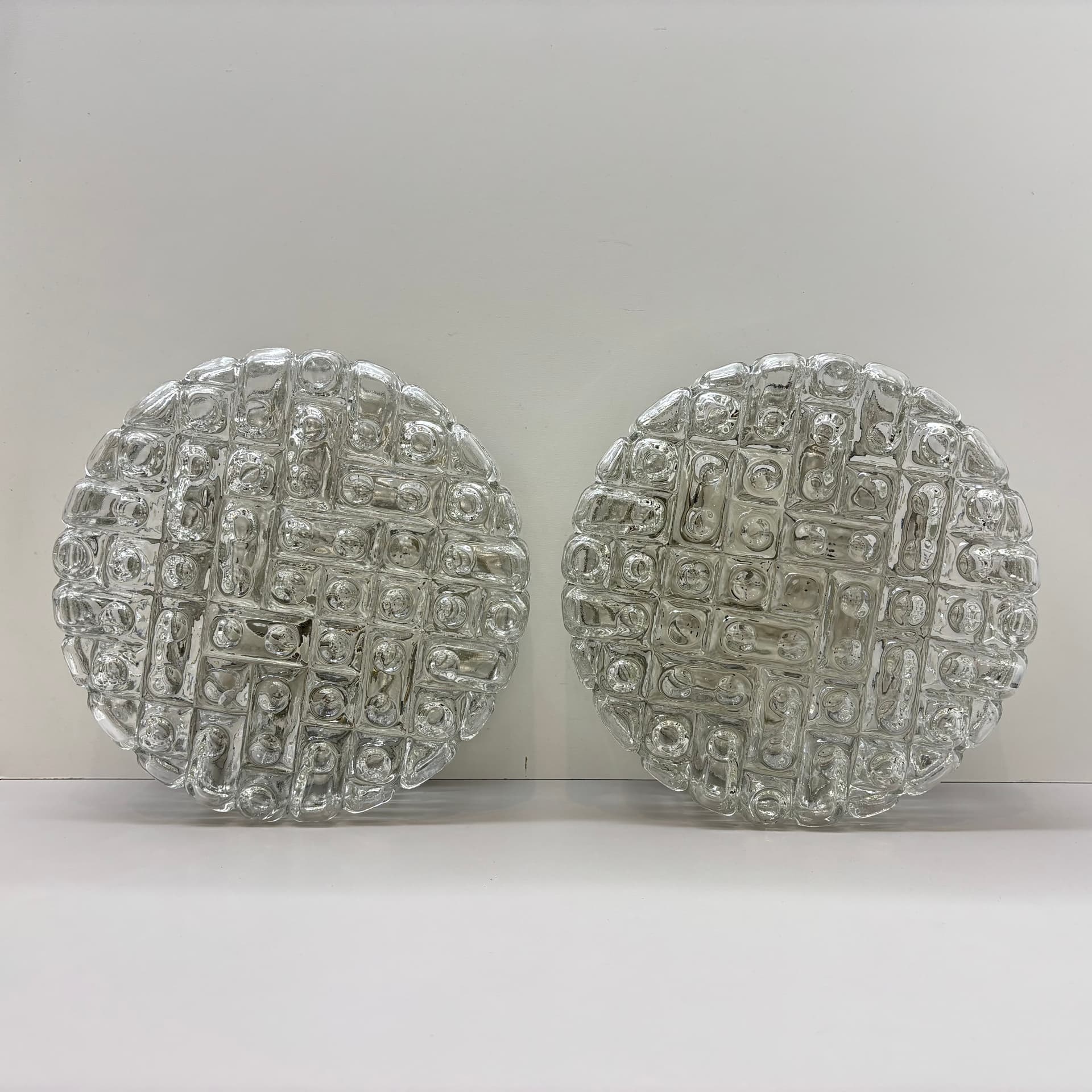 Pair of geometric wall sconces, transparent glass, metal, ERCO, Germany, 1970s. - 225756