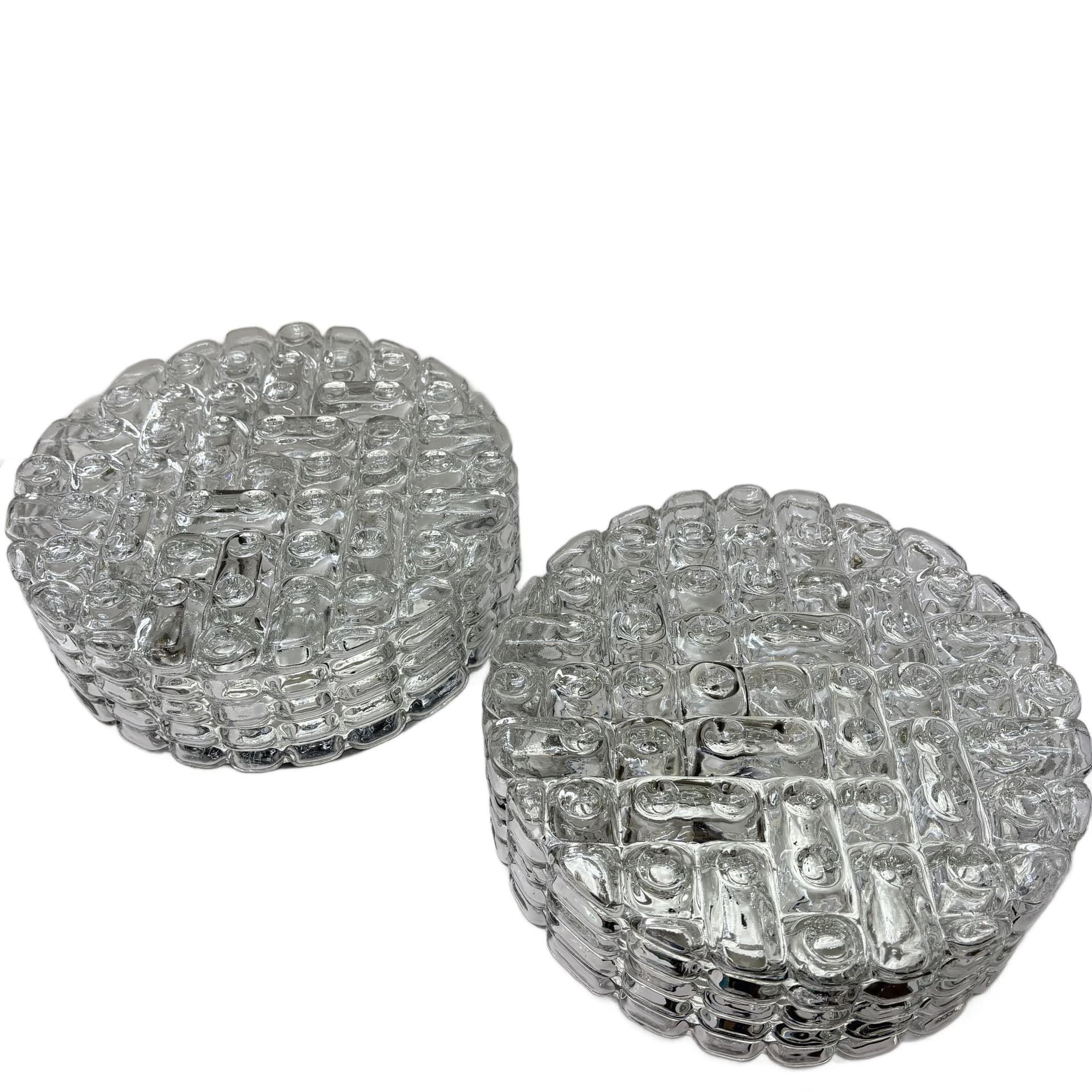 Pair of geometric wall sconces, transparent glass, metal, ERCO, Germany, 1970s.