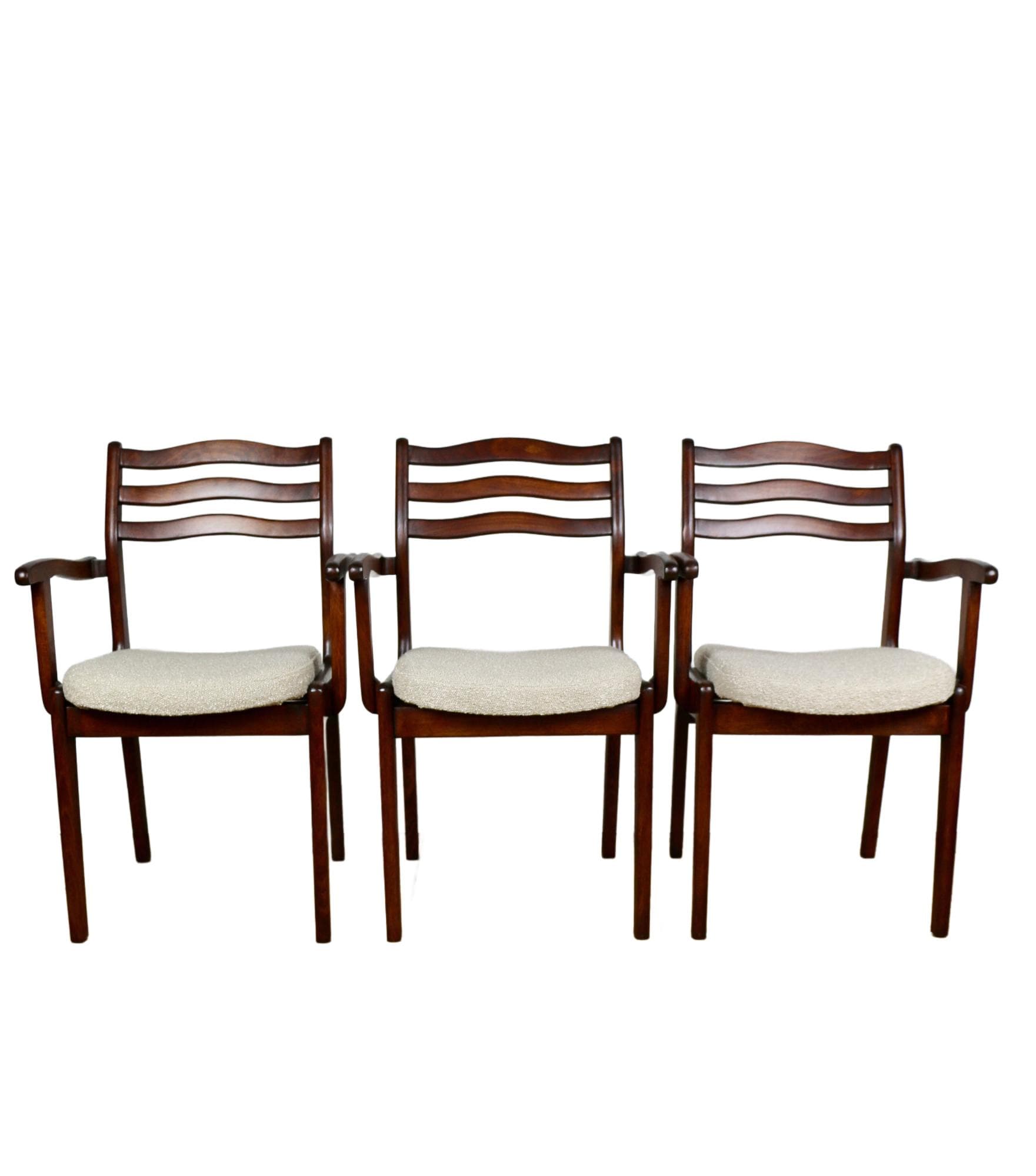 Set of three chairs, beige bouclé, dark walnut-stained beech, Poland, 1970s.