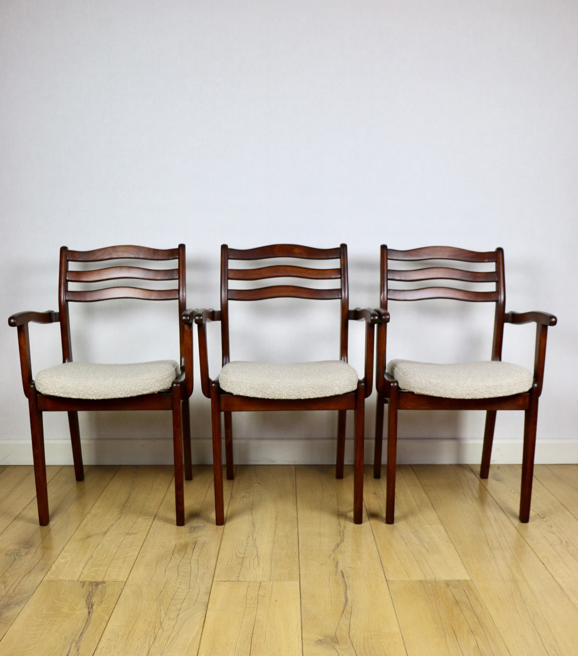 Set of three chairs, beige bouclé, dark walnut-stained beech, Poland, 1970s. - 227223