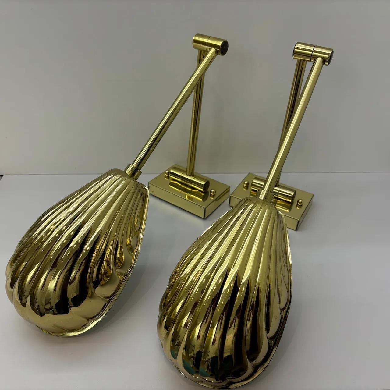 Pair of wall sconces Hollywood Regency, golden, steel brass, USA, 1970s. - 16578