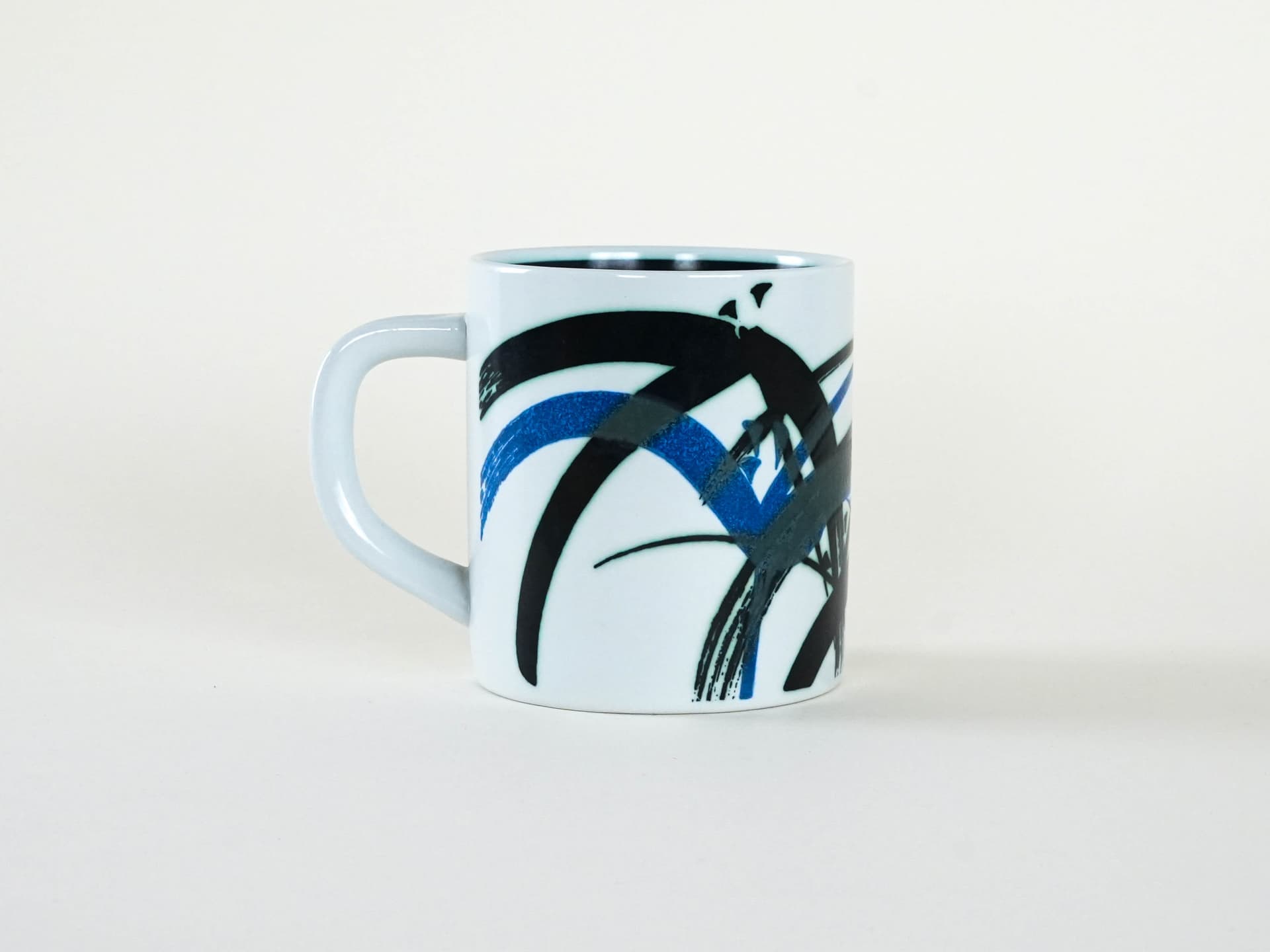 Kubek, biały, porcelana, proj. M. Andersen, Royal Copenhagen, Dania, lata 80. - 230243