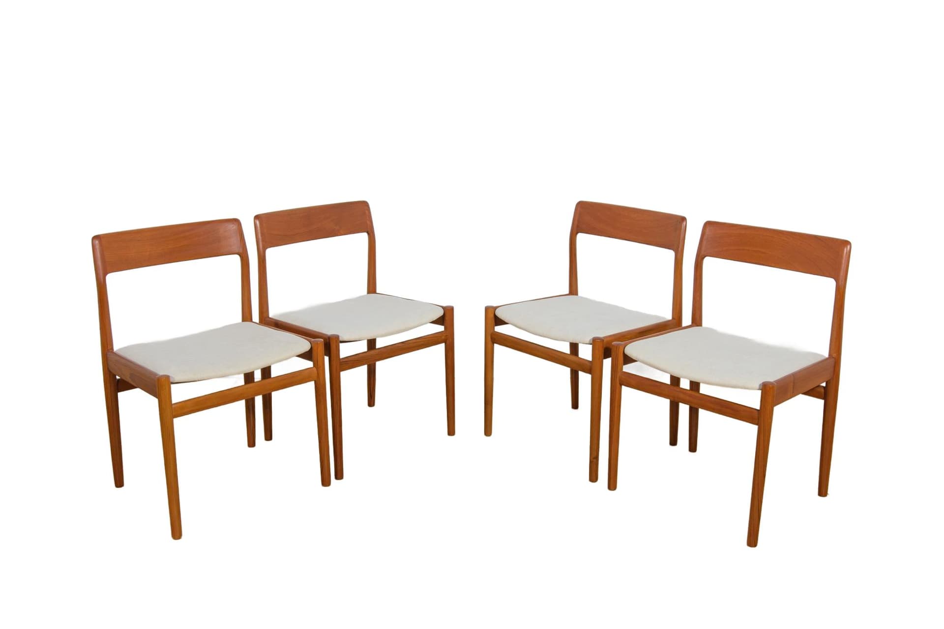Set of four chairs, teak, beige cotton, United Kingdom, 1960s.