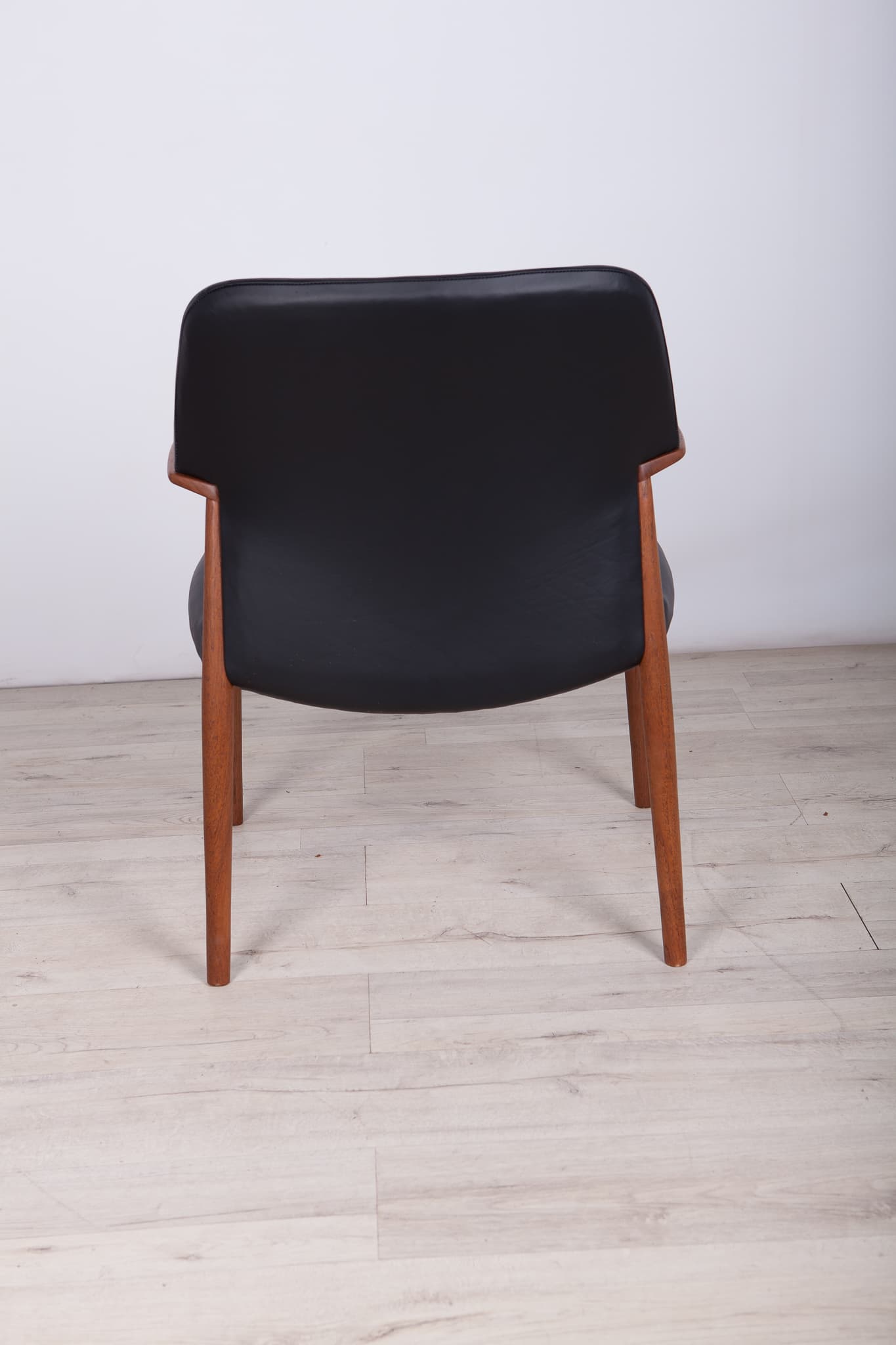 Armchair, teak, black leather, by A. B. Madsen, E. Larsen, Fritz Hansen, Denmark, 1950s. - 243601