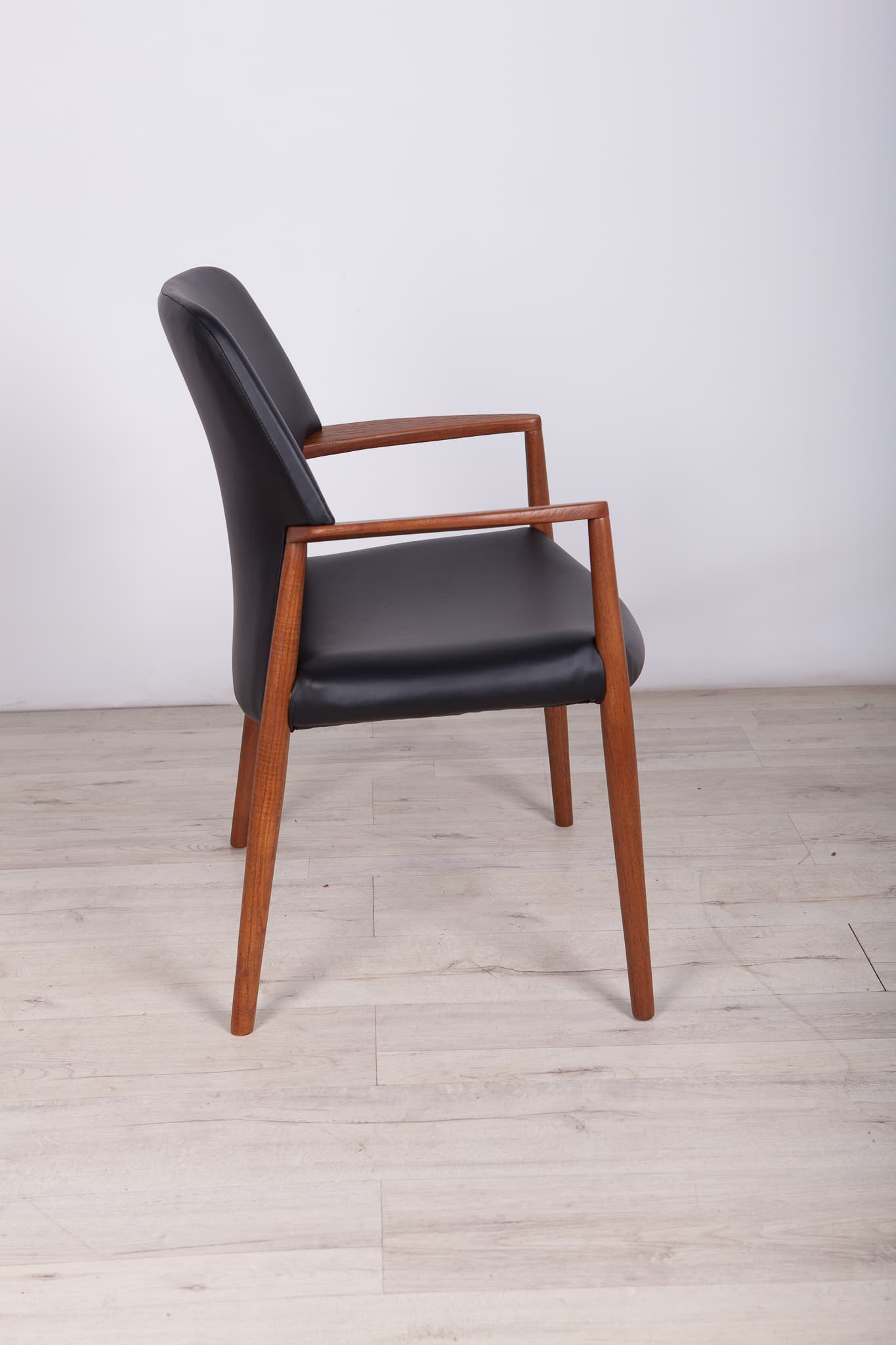 Armchair, teak, black leather, by A. B. Madsen, E. Larsen, Fritz Hansen, Denmark, 1950s. - 243599