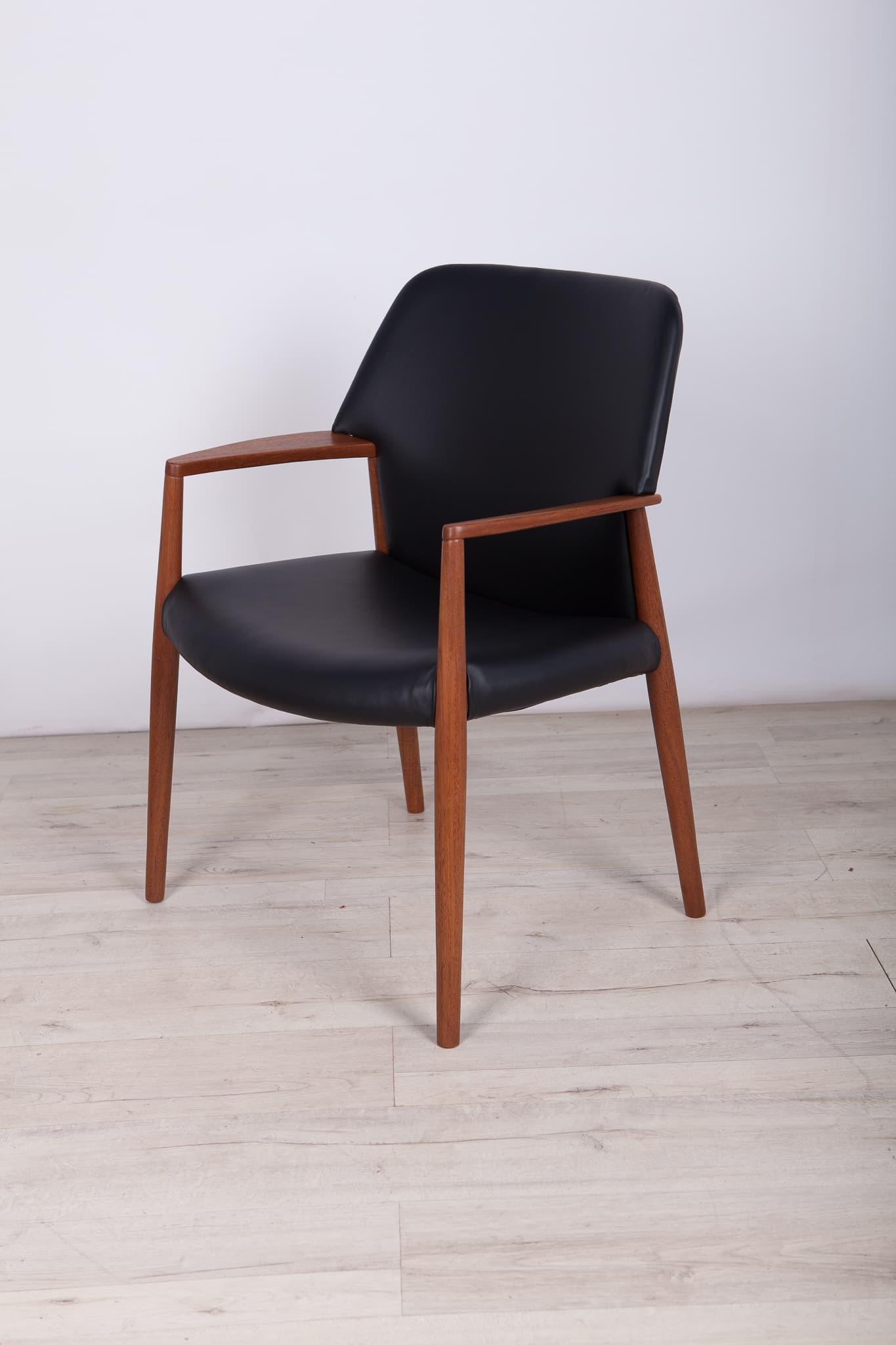 Armchair, teak, black leather, by A. B. Madsen, E. Larsen, Fritz Hansen, Denmark, 1950s. - 243594