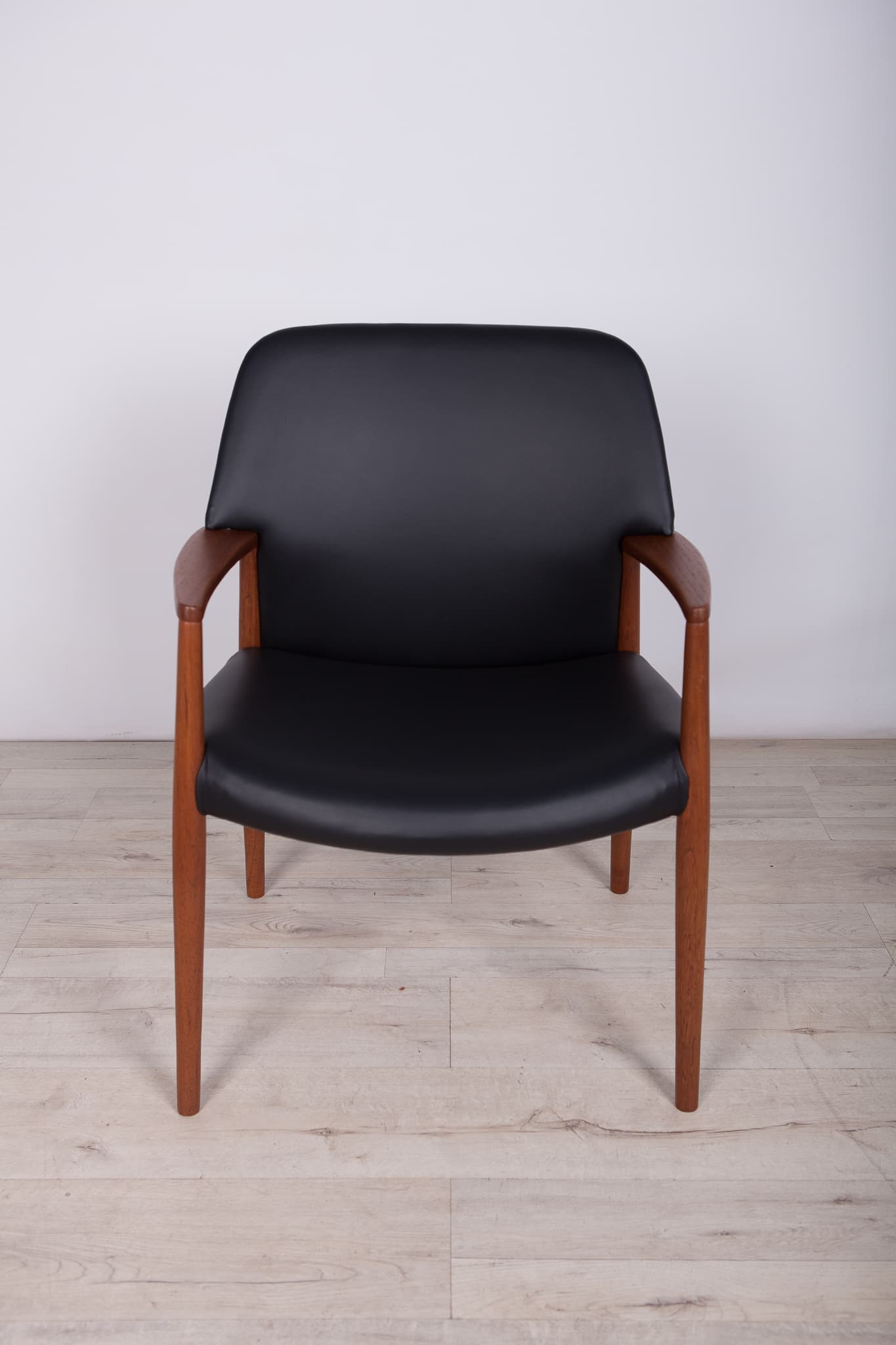 Armchair, teak, black leather, by A. B. Madsen, E. Larsen, Fritz Hansen, Denmark, 1950s. - 243596